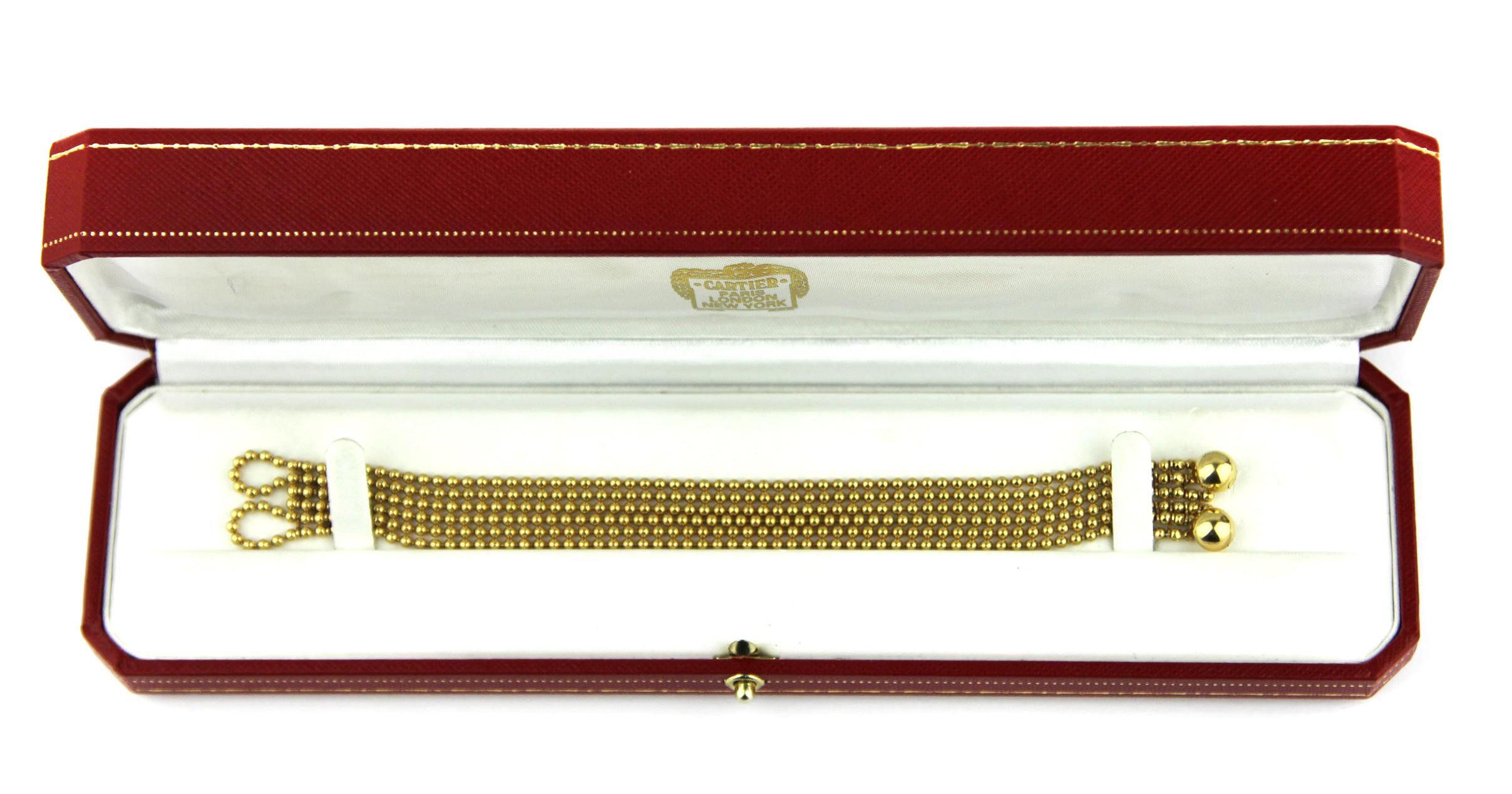 Cartier, ‘Draperie’ 18 Carat Gold Bracelet Design as Six Strang/Row of Beads In Excellent Condition In London, GB