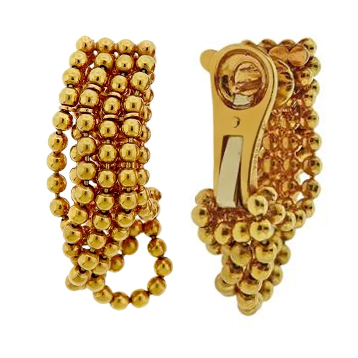 A magnificent set of authentic Cartier earrings featuring a beaded design in shimmering 18k yellow gold. The earrings are circa 1990s and measure 1.37