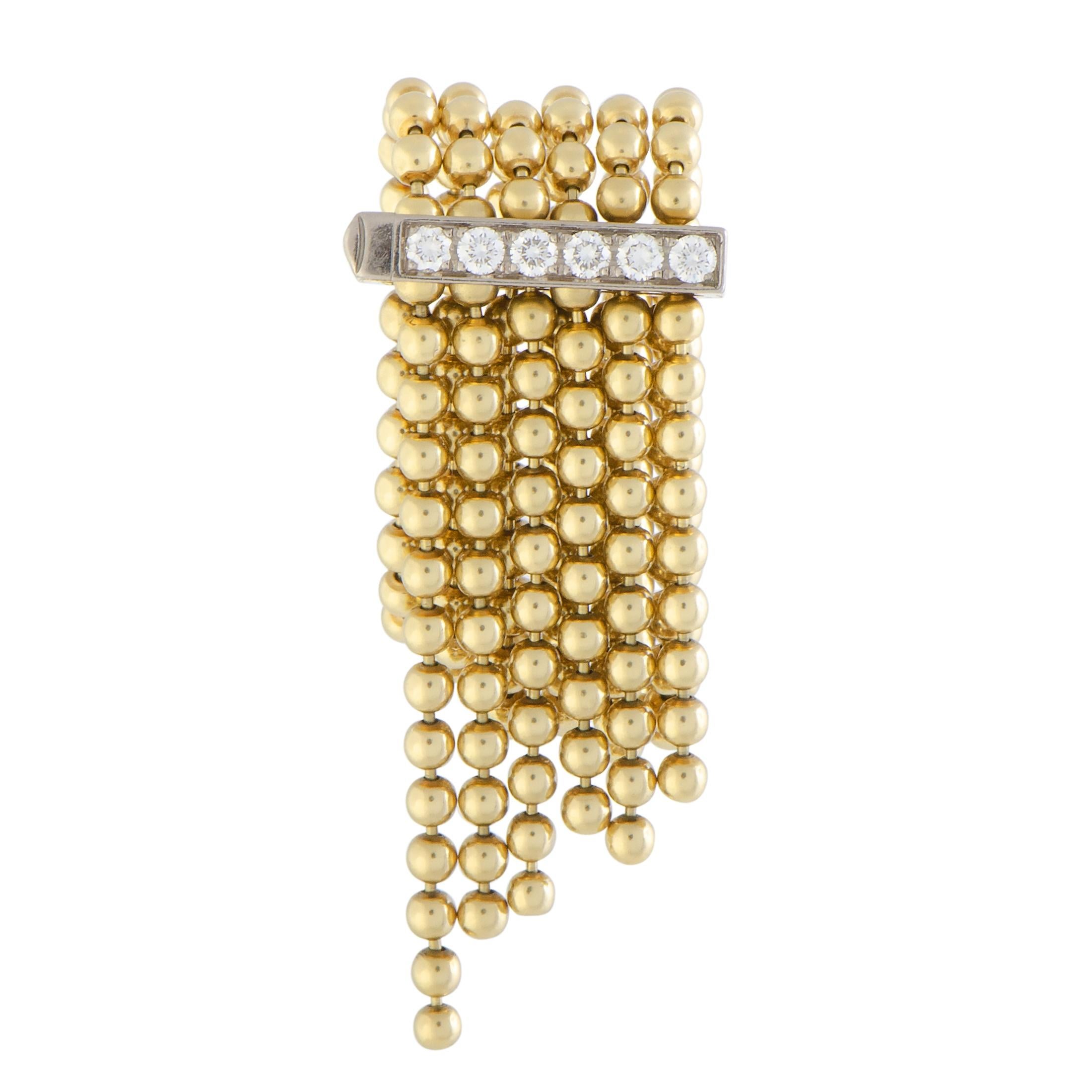 Presented within the extraordinary “Draperie” collection, this stunning Cartier ring compels with its exceptional design that boasts a distinctly antique appeal, offeringa look of utmost sophistication. The ring is beautifully crafted from 18K