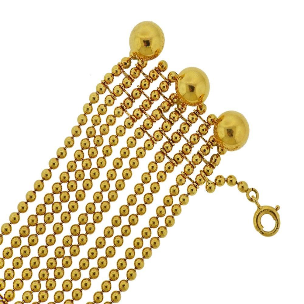 18k yellow gold ten strand bracelet from Draperie de Decolette, by Cartier. Bracelet is 6.75