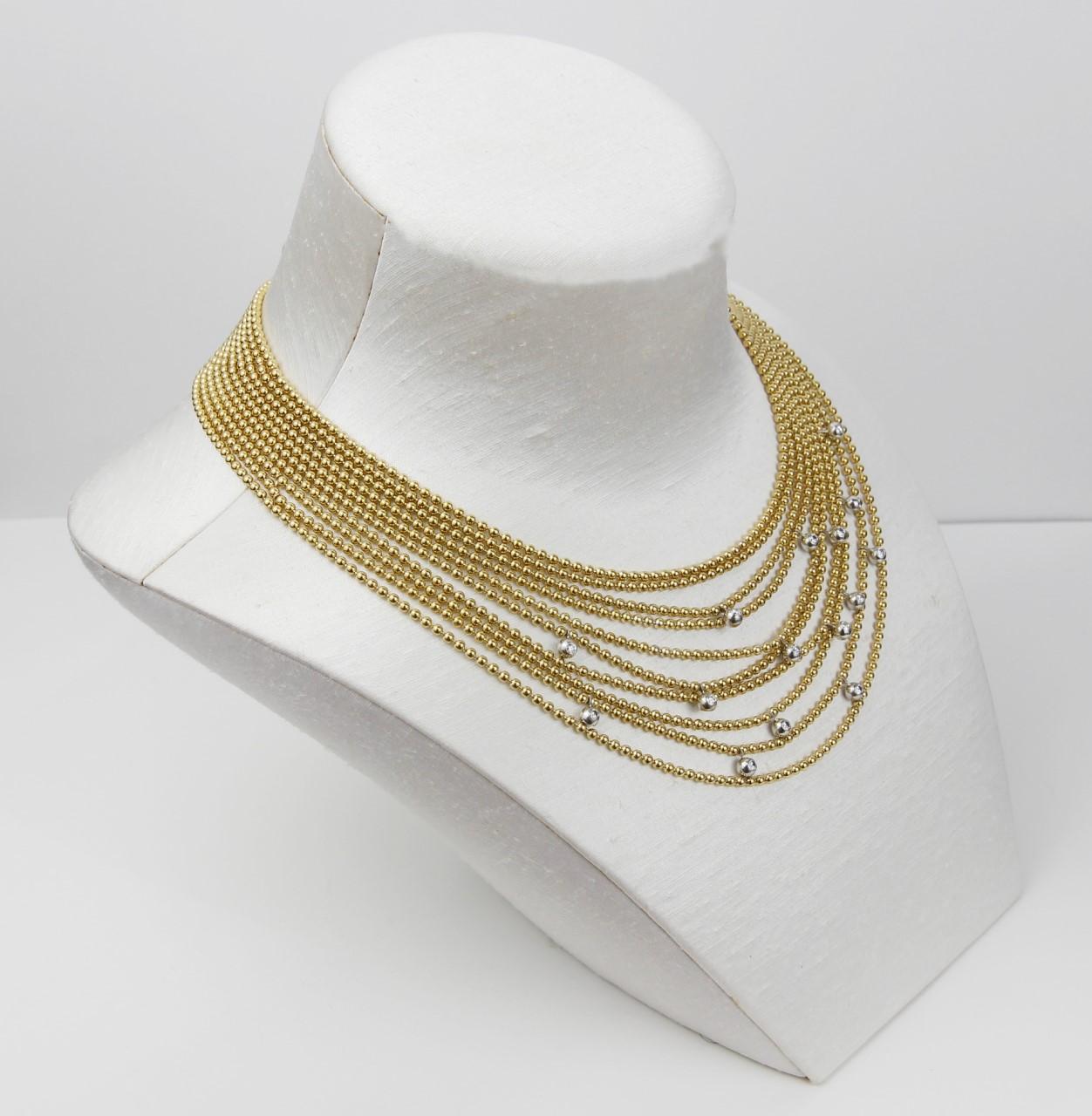 Cartier Draperie De Décolleté Diamond 18K Yellow Gold Multi Link Choker Necklace
The House of Cartier presents their Collection Draperie de Décolleté circa 1930s.
This magnificent piece is crafted in solid 18K yellow gold beads, gradually presented