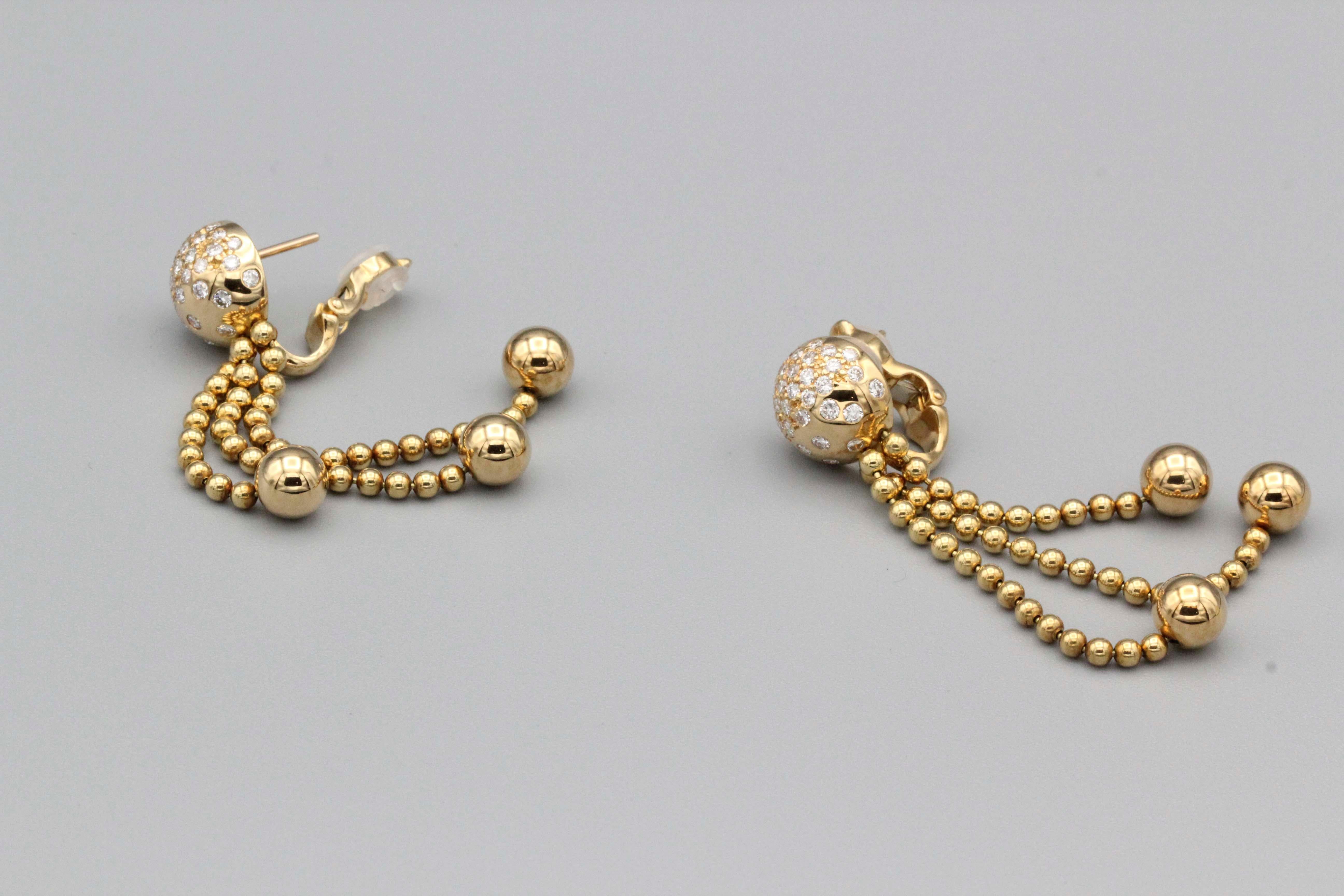 Elegant diamond and 18K yellow gold tassel earrings from the 