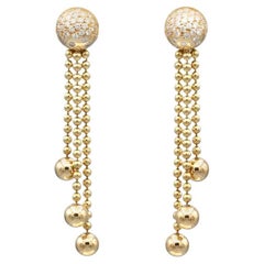 Boucles d'oreilles à pompon en or 18k et diamants de Cartier Draperie
