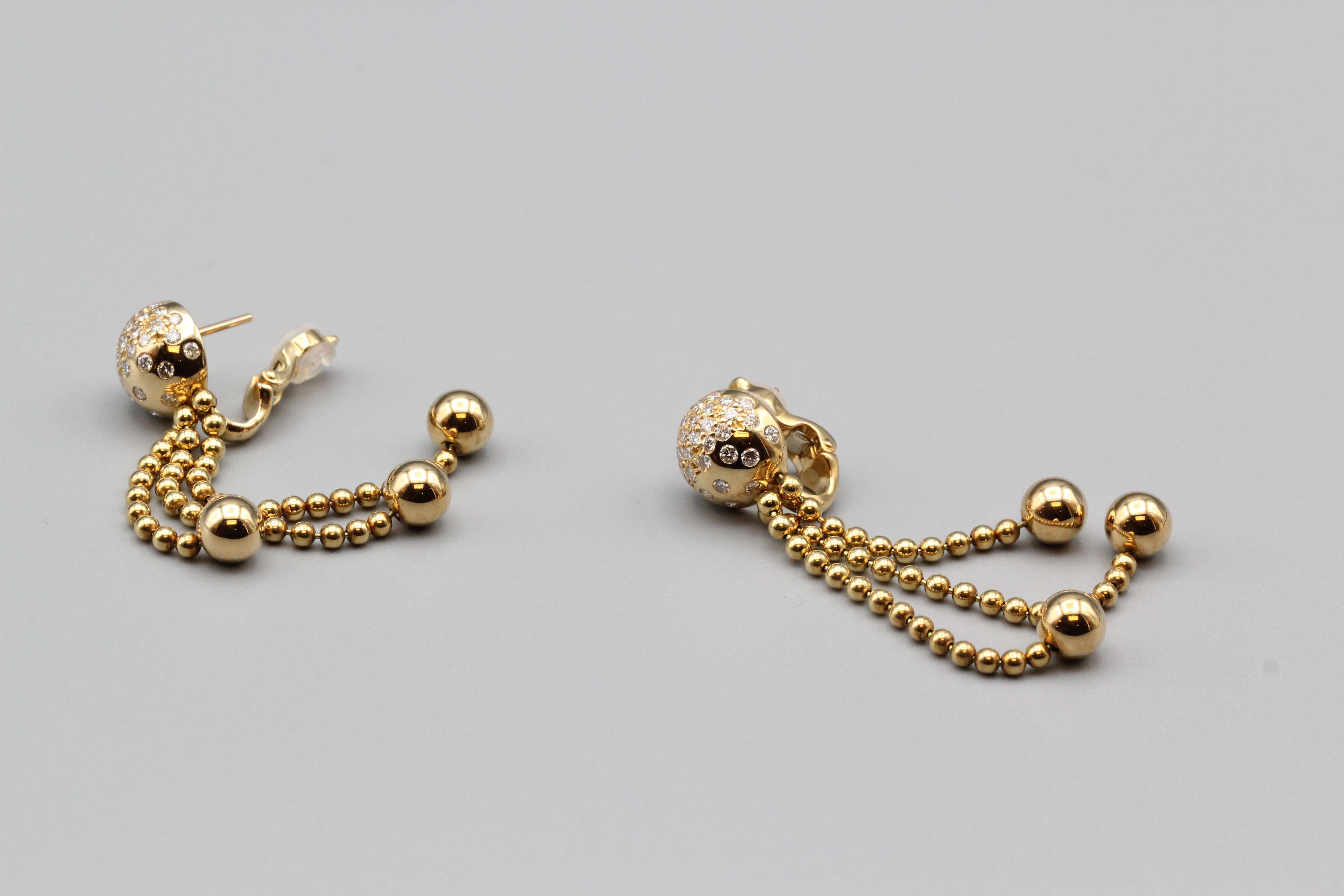 Introducing the Cartier Draperie Diamond 18k Gold Tassel Earrings—an opulent masterpiece that effortlessly blends timeless elegance with modern sophistication. These earrings are a true testament to Cartier's legacy of luxury, innovation, and