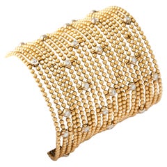 Cartier "Draperie" Bracciale in oro 18 carati con diamanti