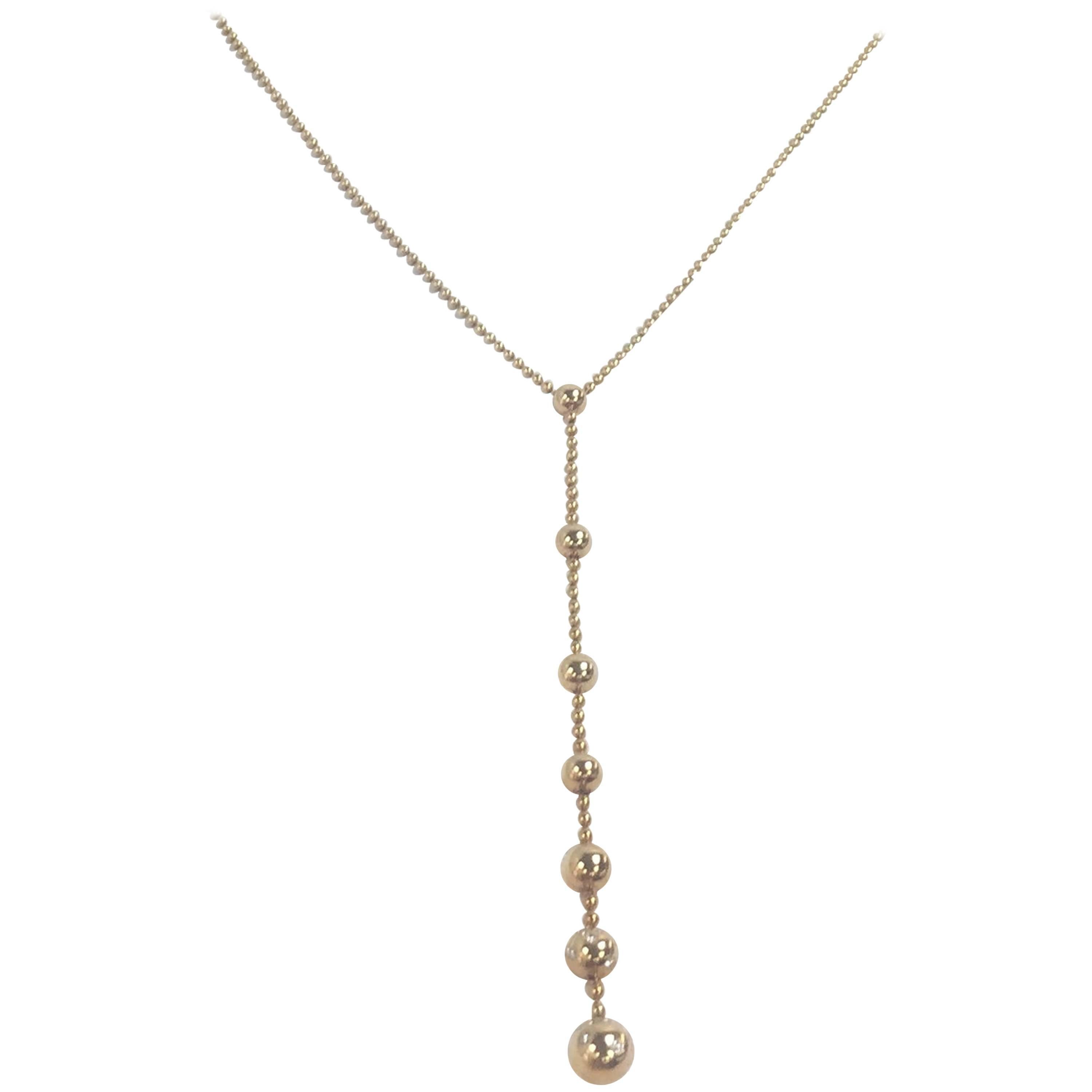 Cartier "Draperie" Lariat Necklace in 18 Karat Gold
