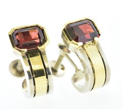 Cartier Earrings in 18 Gold and Sterling Silver Centering Emerald Cut Garnets