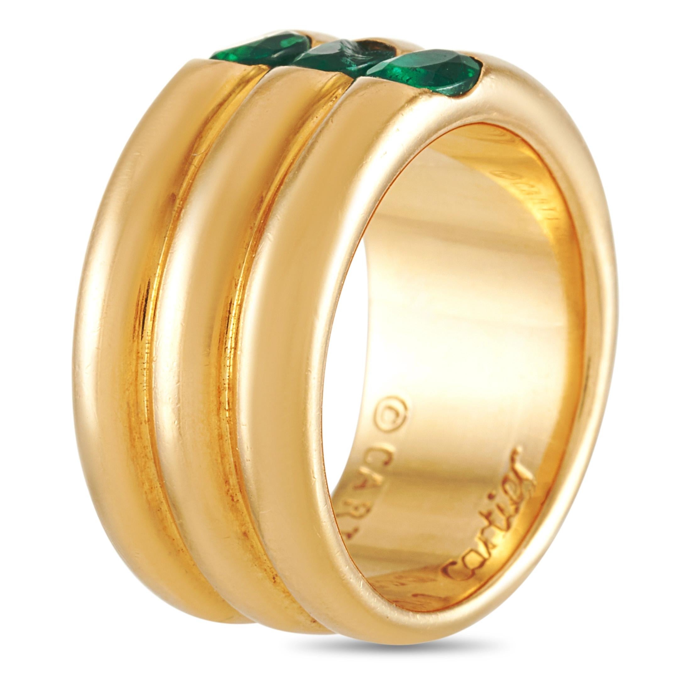 The Cartier “Eclipse” ring is made of 18K yellow gold and embellished with emeralds. The ring weighs 15.9 grams and boasts band thickness of 10 mm, while top dimensions measure 10 by 4 mm.
 
 This jewelry piece is offered in estate condition and