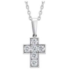 Cartier Pendentif croix en or blanc dix-huit carats et diamants