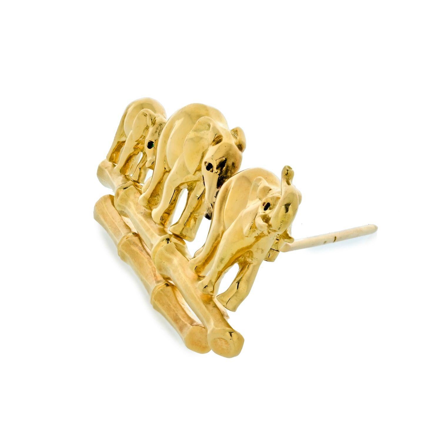 A lust-worthy piece from the House of Cartier, the Elephant Family design is always in style. This brooch is made of yellow gold and displays a family of elephants walking in a procession line. Lastly, the adult elephants each have an eye made of