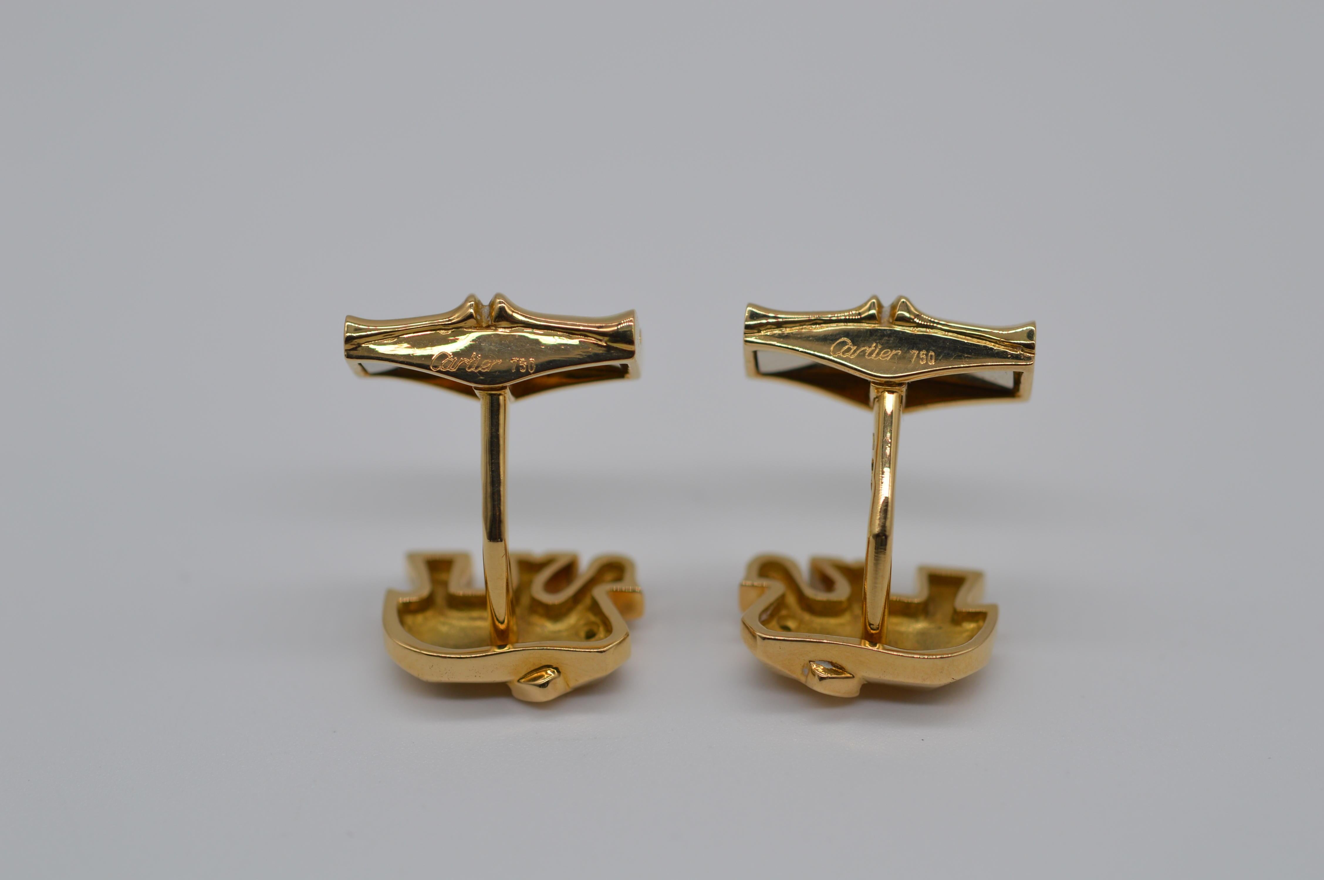 Contemporary Cartier Elephant Cufflink 18K Yellow Gold with Emerald Eye Unworn For Sale