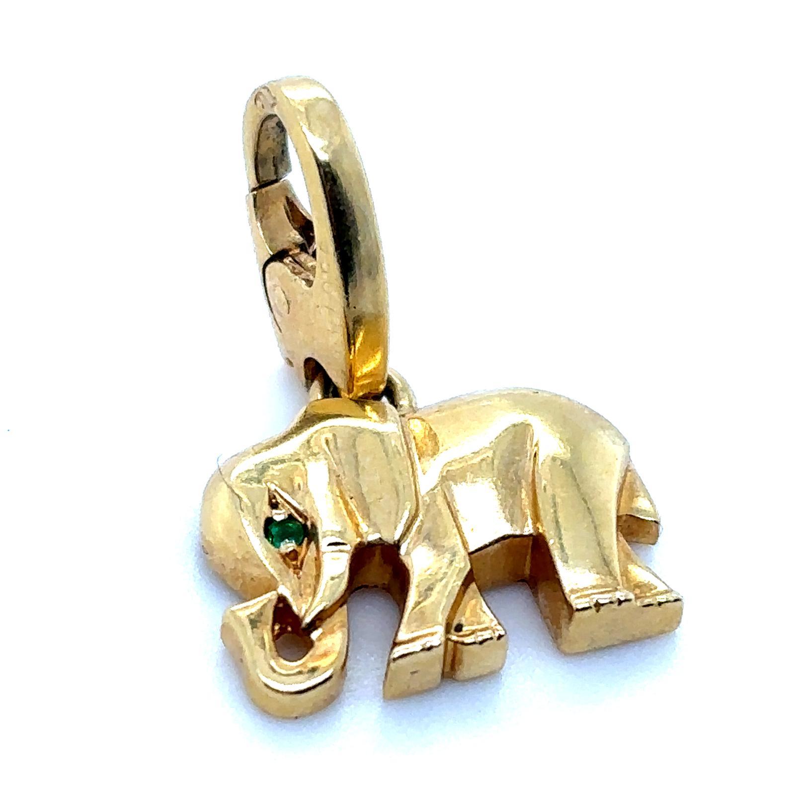 A Cartier elephant emerald charm in 18 karat yellow gold.

This sweet 18 karat yellow gold charm was created by Cartier for their charm collection to enhance either their bracelets or necklaces. 

With the plain polished yellow gold elephant