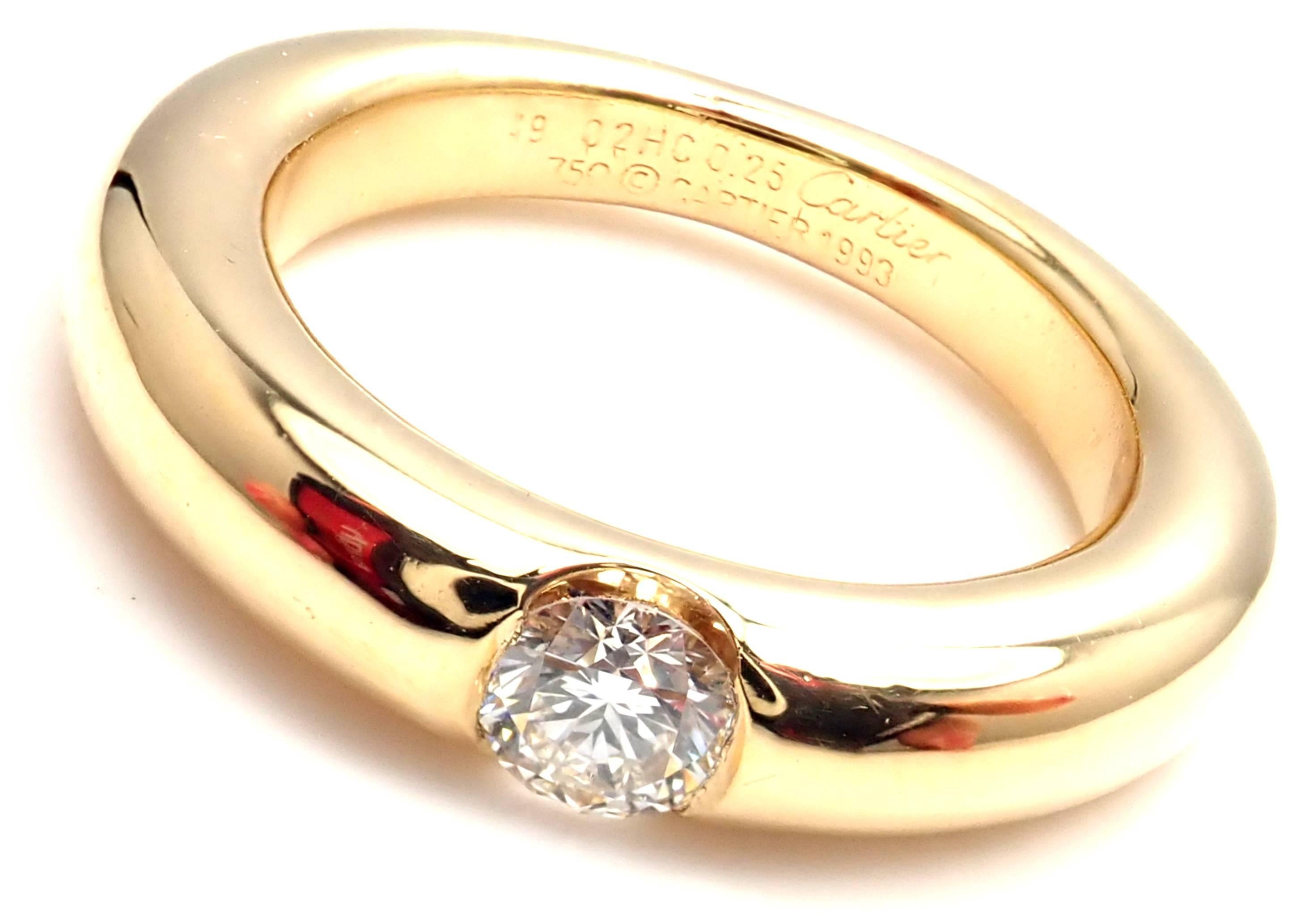 18k Yellow Gold Ellipse Diamond Band Ring by Cartier.
With 11 round brilliant cut diamond VS1 clarity, G color total weight approx..25ct
Details:
Width: 4mm
Weight: 8.6 grams
Ring Size: European 49,  US 4 3/4
Stamped Hallmarks: Cartier 750 49 O2HC