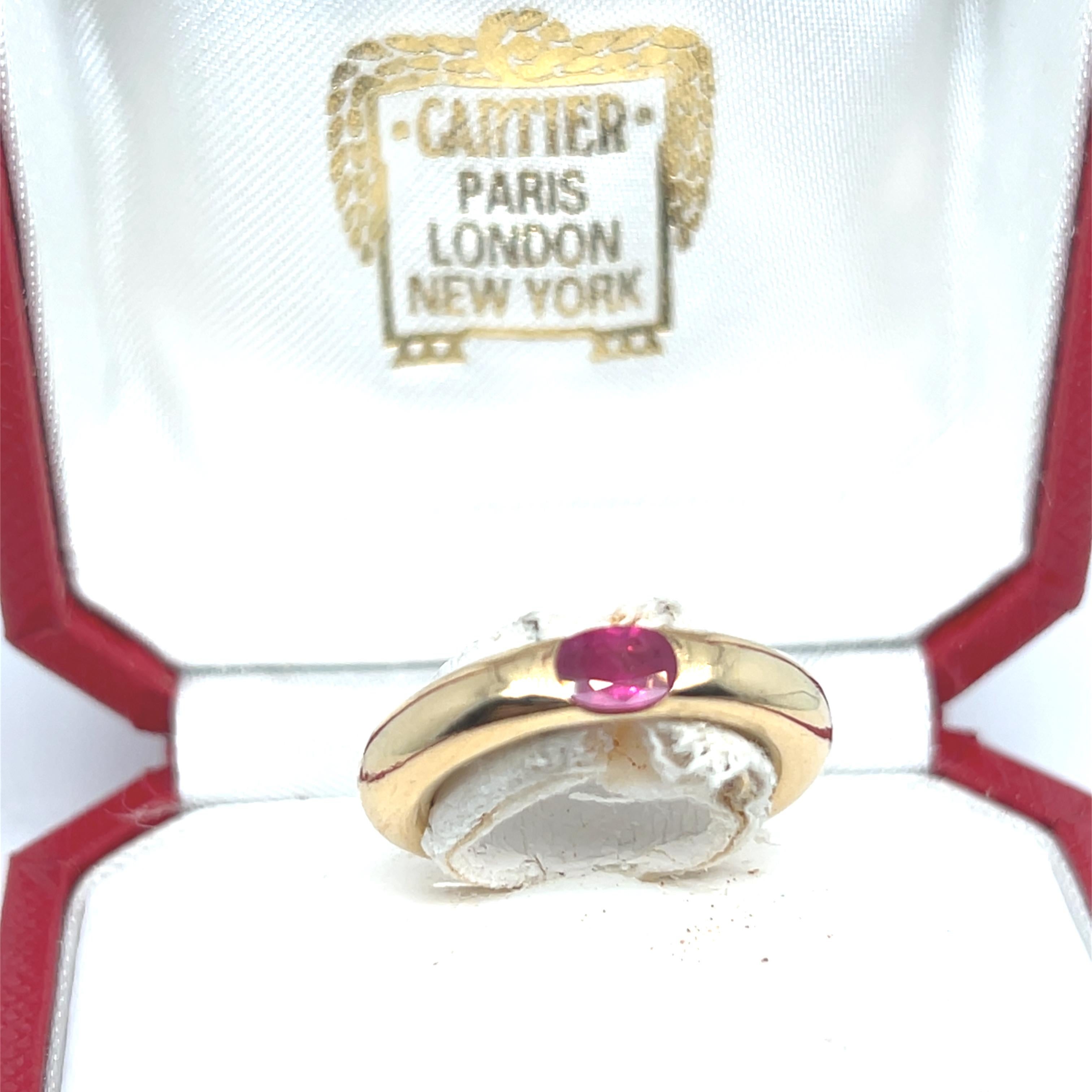 Oval Cut Cartier Ellipse Oval Ruby Yellow Gold 18 Carats Ring For Sale