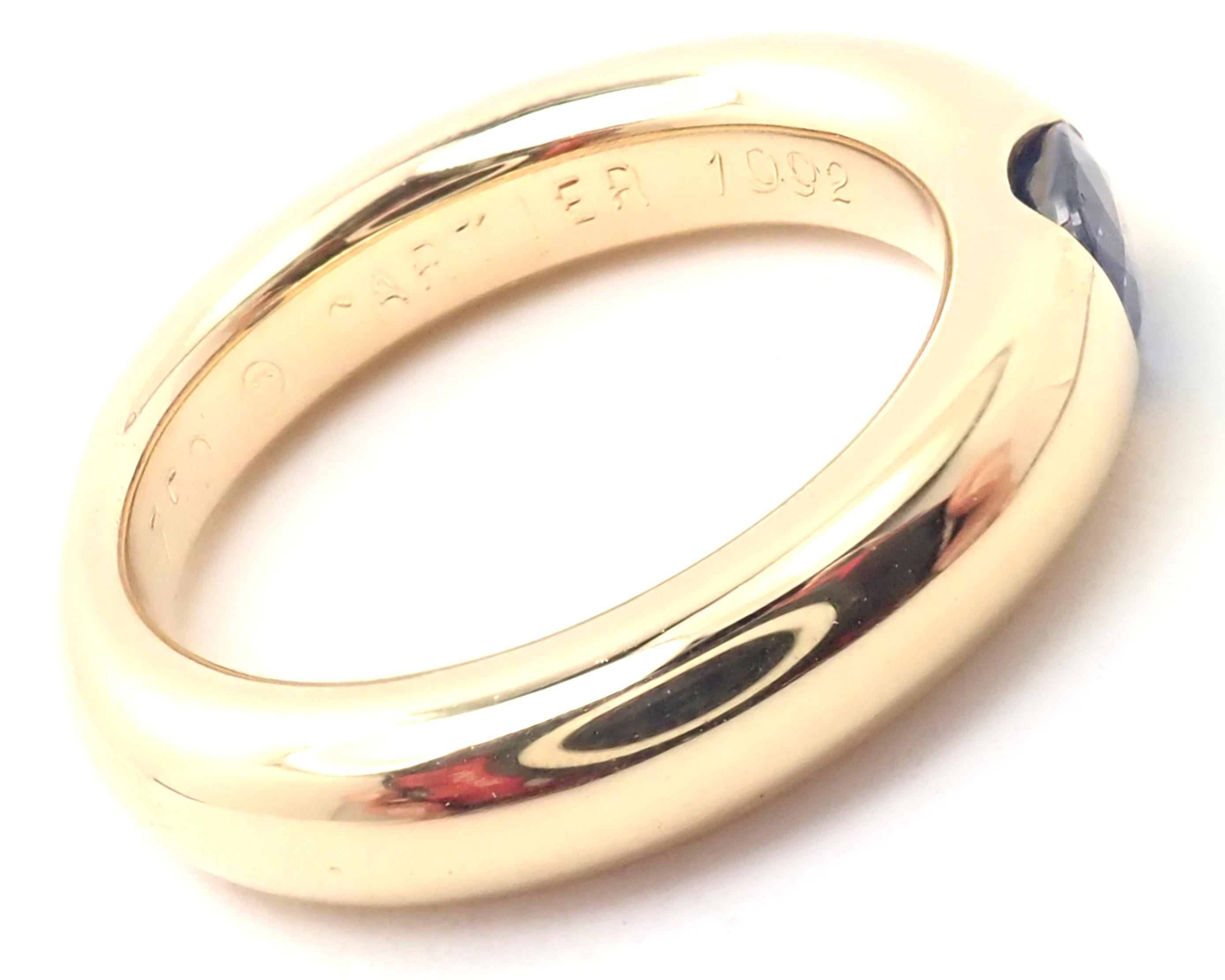 18k Yellow Gold Ellipse Sapphire Band Ring by Cartier.
With 1 oval-shaped beautiful sapphire 5mm x 4mm.
Details:
Width: 4mm
Weight: 9.1 grams
Ring Size: European 51, US 5 3/4
Stamped Hallmarks: Cartier 750 51 1992 96XXX(serial number omitted)
*Free