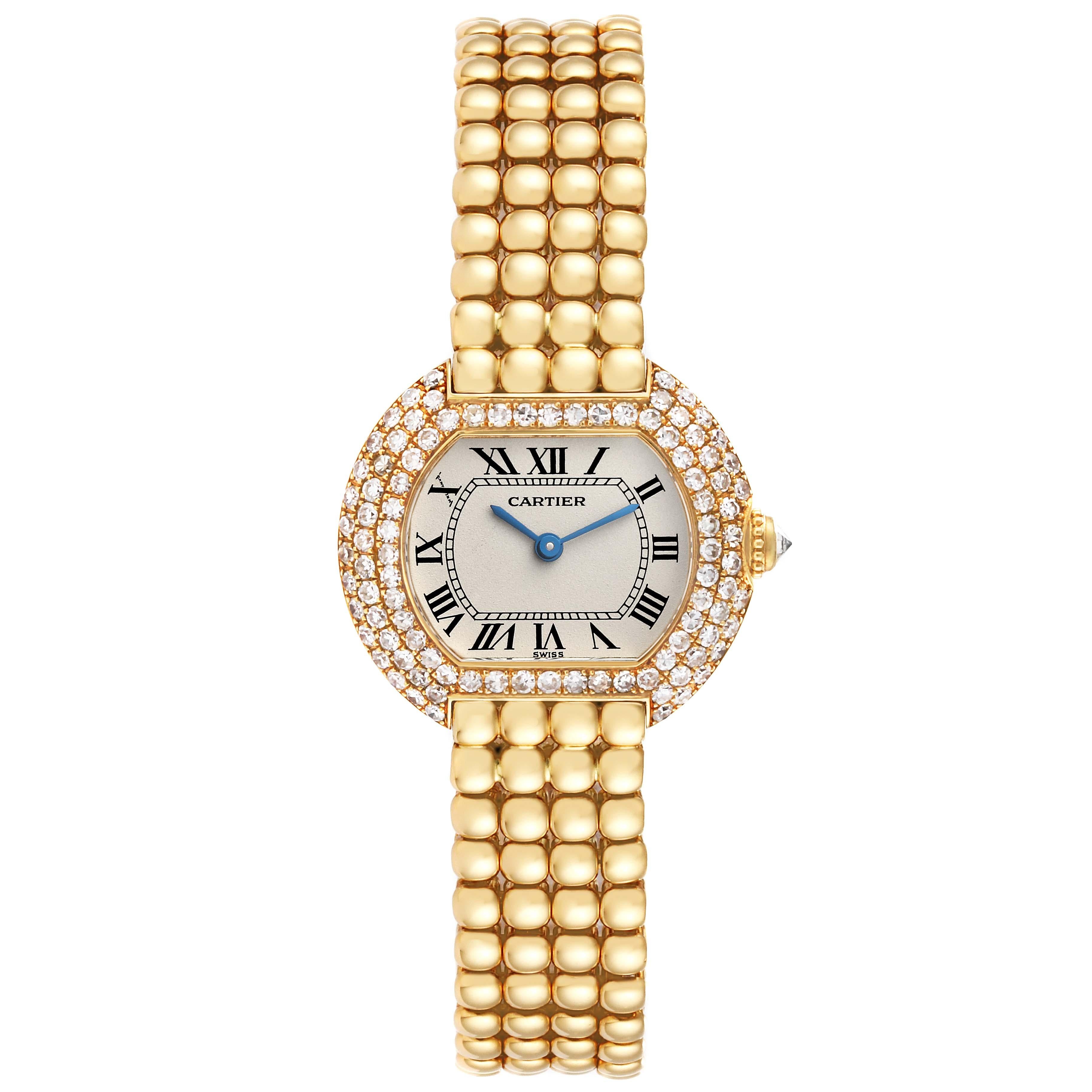 Cartier Ellipse Yellow Gold Diamond Bezel Ladies Watch 8660. Quartz movement. 18K yellow gold case 26.0 x 22.0 mm. Crown set with an original Cartier factory diamond. 18K yellow gold bezel set with three rows of original Cartier factory diamonds.