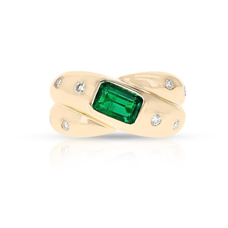 Cartier Emerald and Diamond Criss Cross Ring, 18k In Excellent Condition For Sale In New York, NY