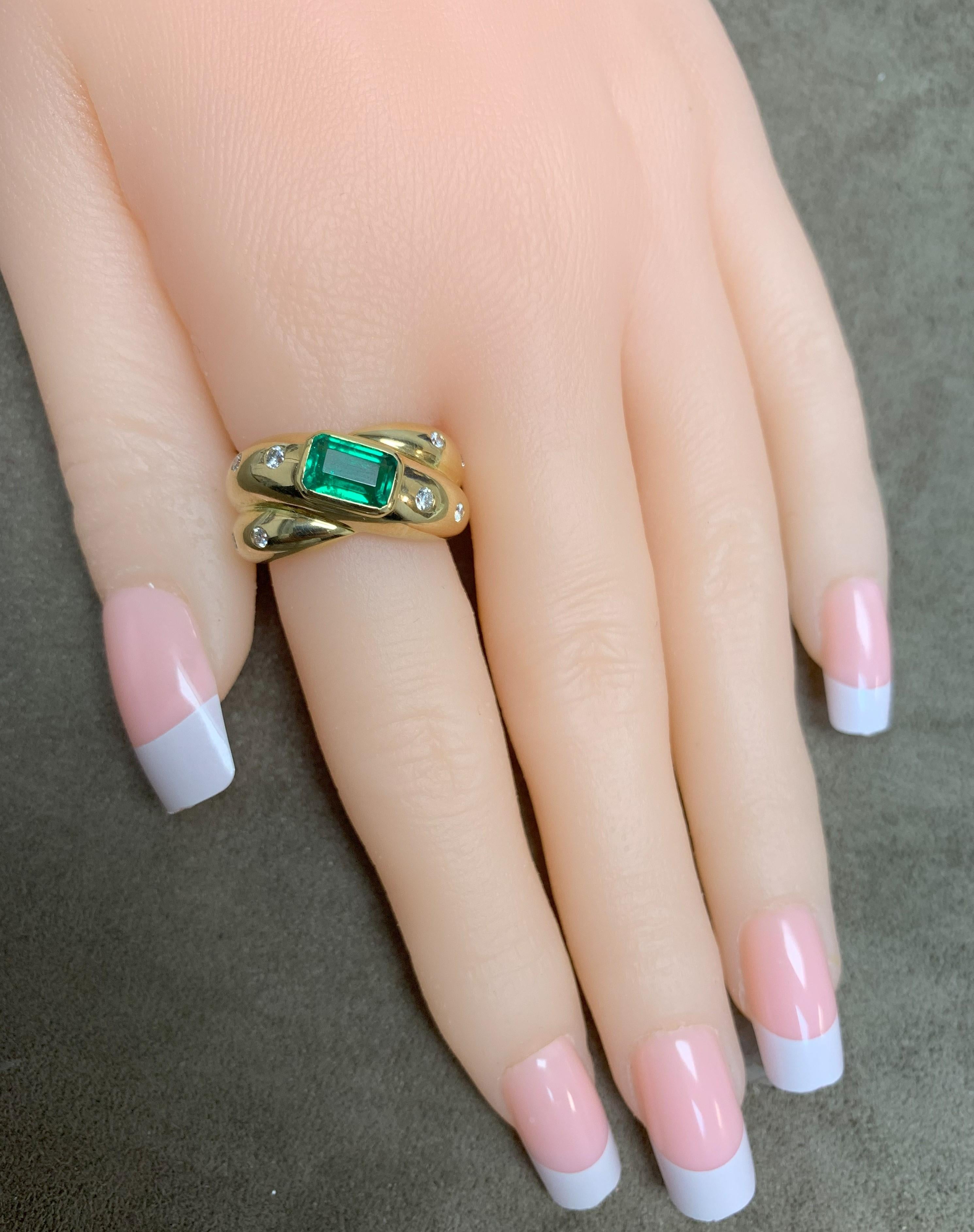 Emerald Cut Cartier Emerald and Diamond Criss Cross Ring, 18k For Sale