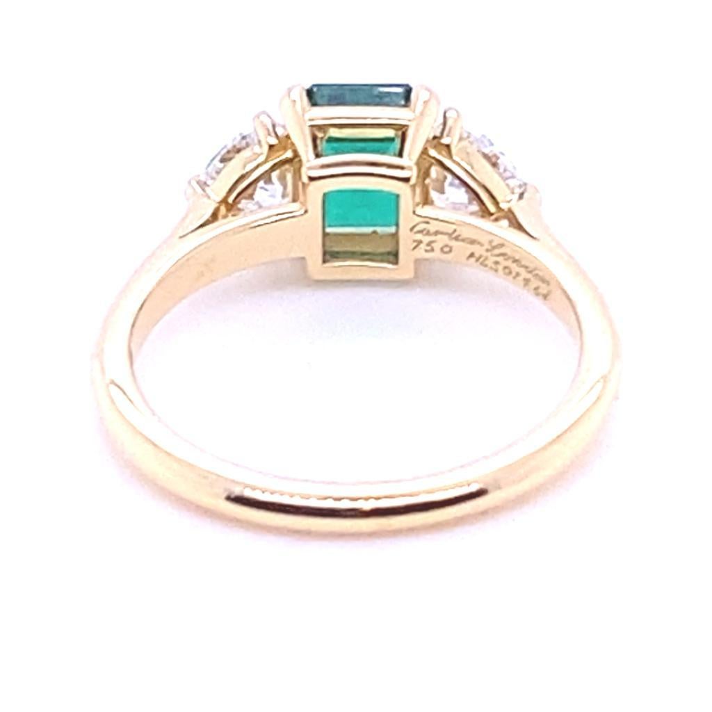 Emerald Cut Cartier Emerald and Diamond Three Stone 18 Karat Yellow Gold Ring