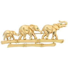 Vintage Cartier Emerald Walking Elephant Family Brooch Set in 18 Karat Yellow Gold