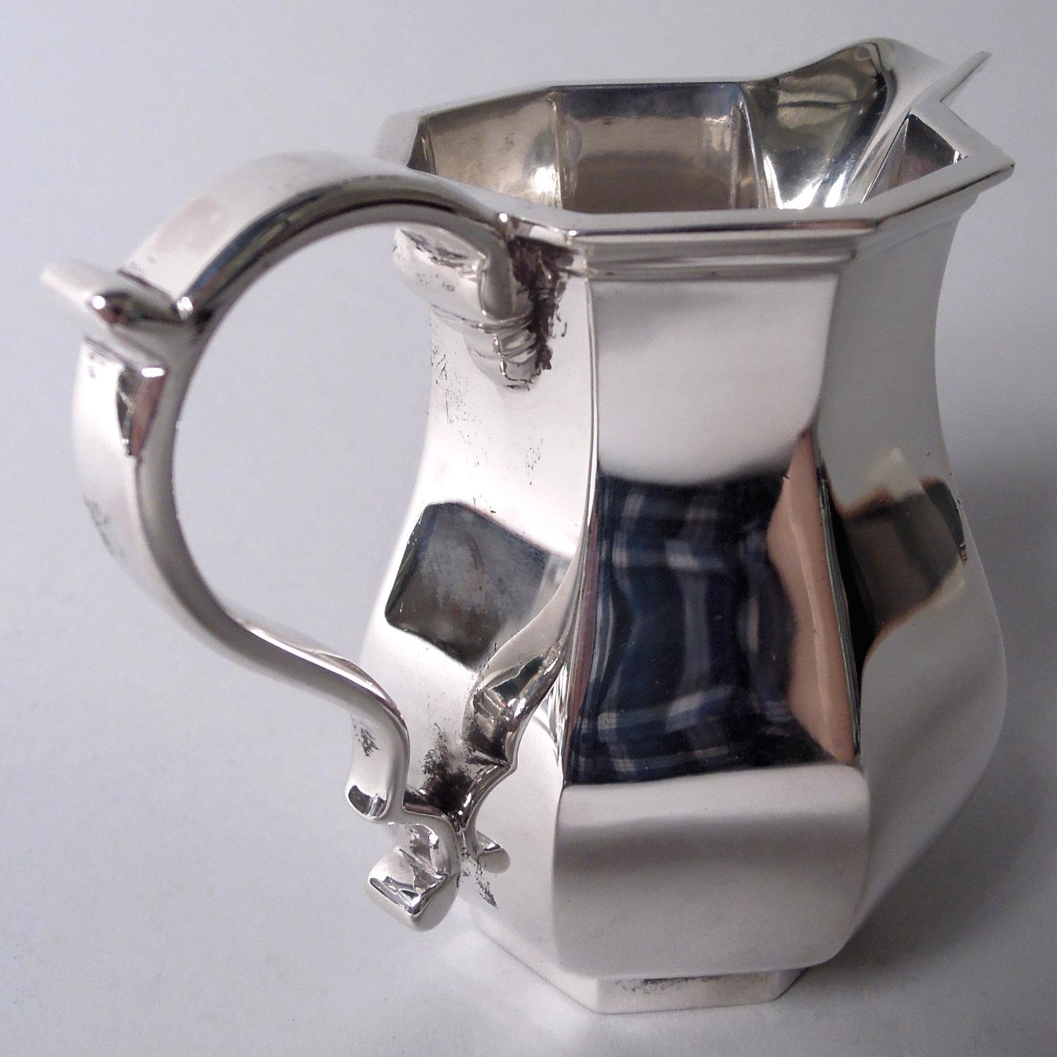Juego de café y té de 4 piezas de plata de ley georgiana inglesa Cartier Plata esterlina en venta
