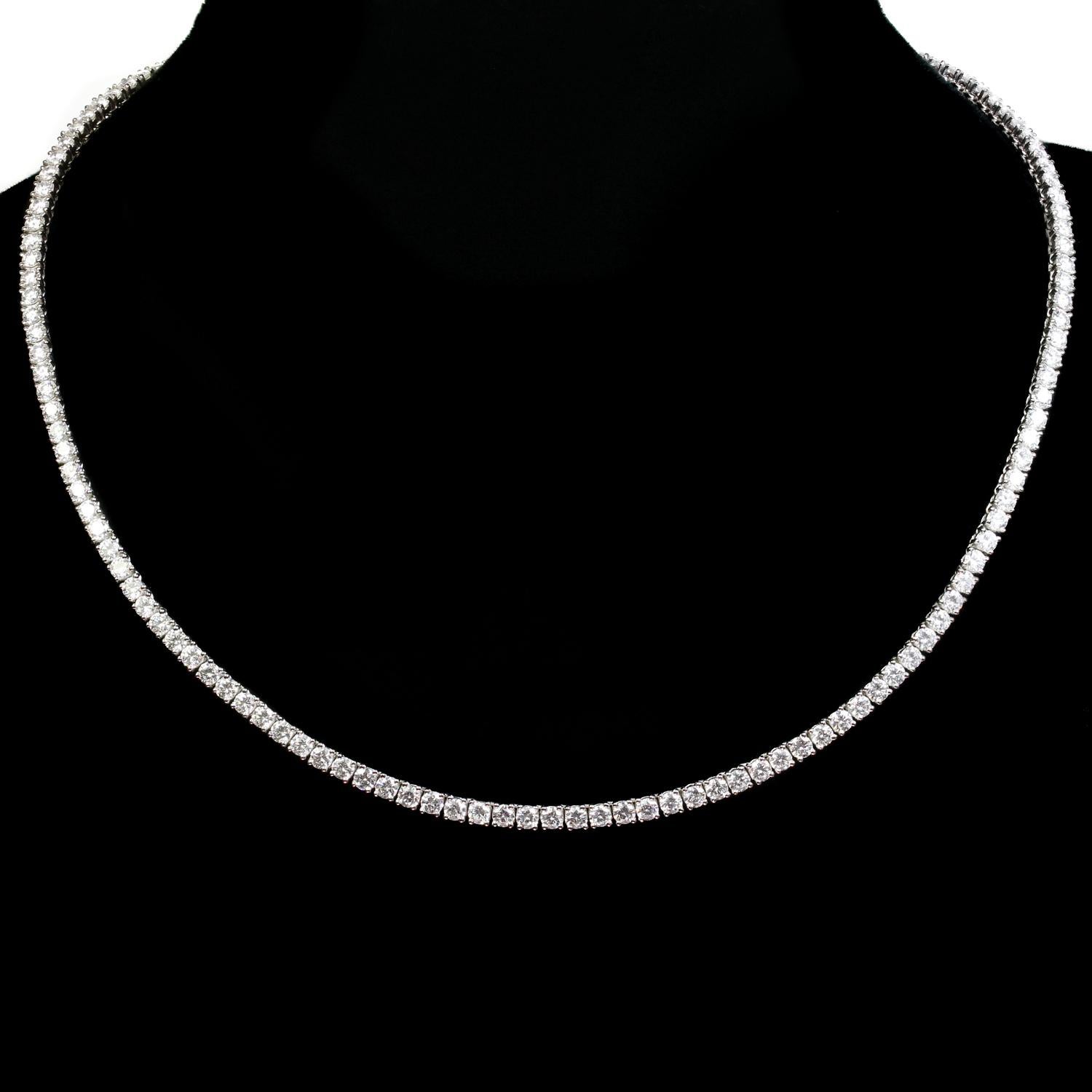 This exquisite Essential Lines  Cartier necklace features a classic tennis design crafted in 18k white gold and set with brilliant-cut round D-F VVS1-VVS2 diamonds of an estimated 10.00 carats. Made in France circa 2000s. Measurements: 0.11