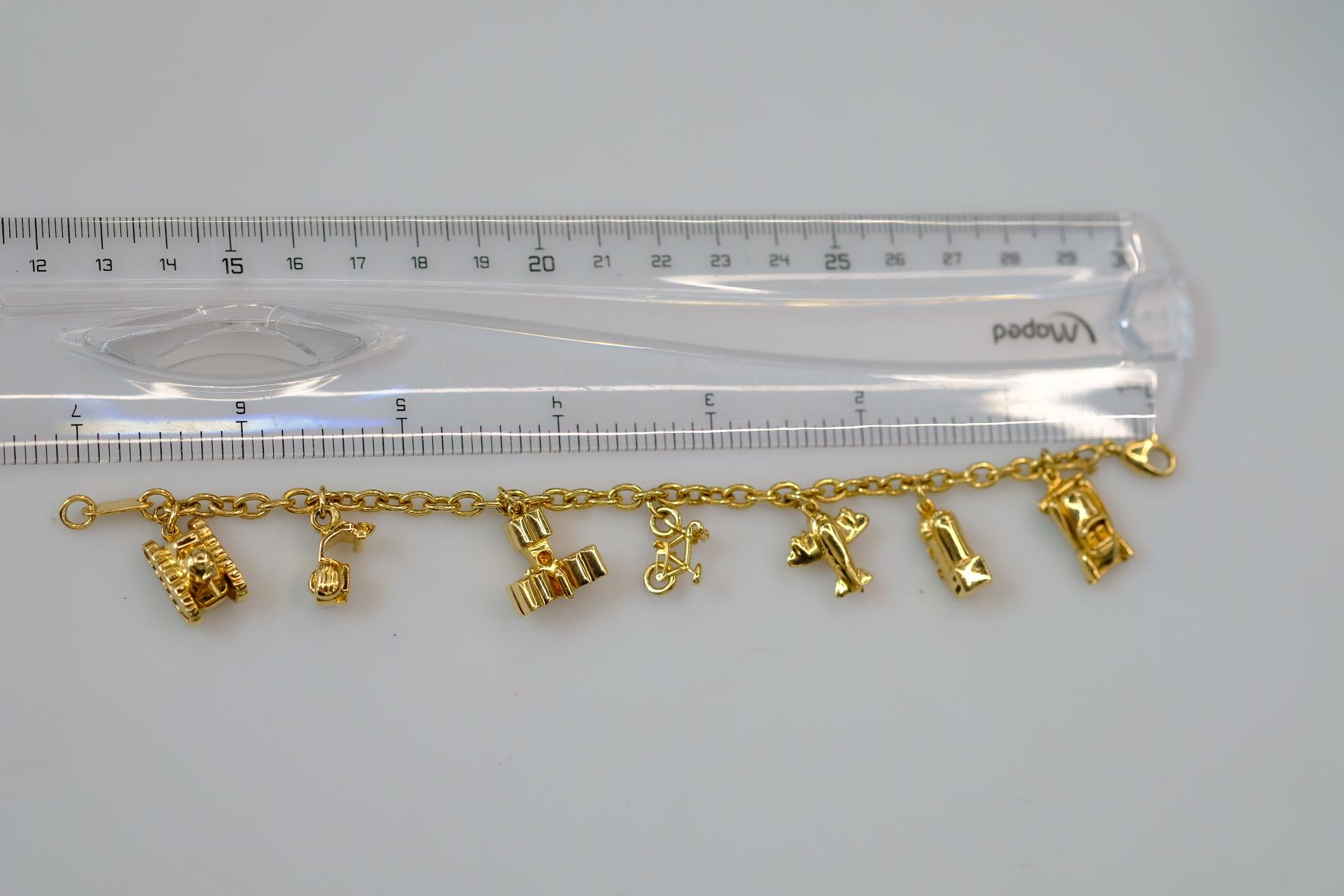 Cartier Estate 18K Gelbgold 7 Charm Merry-Go-Round-Armband 10