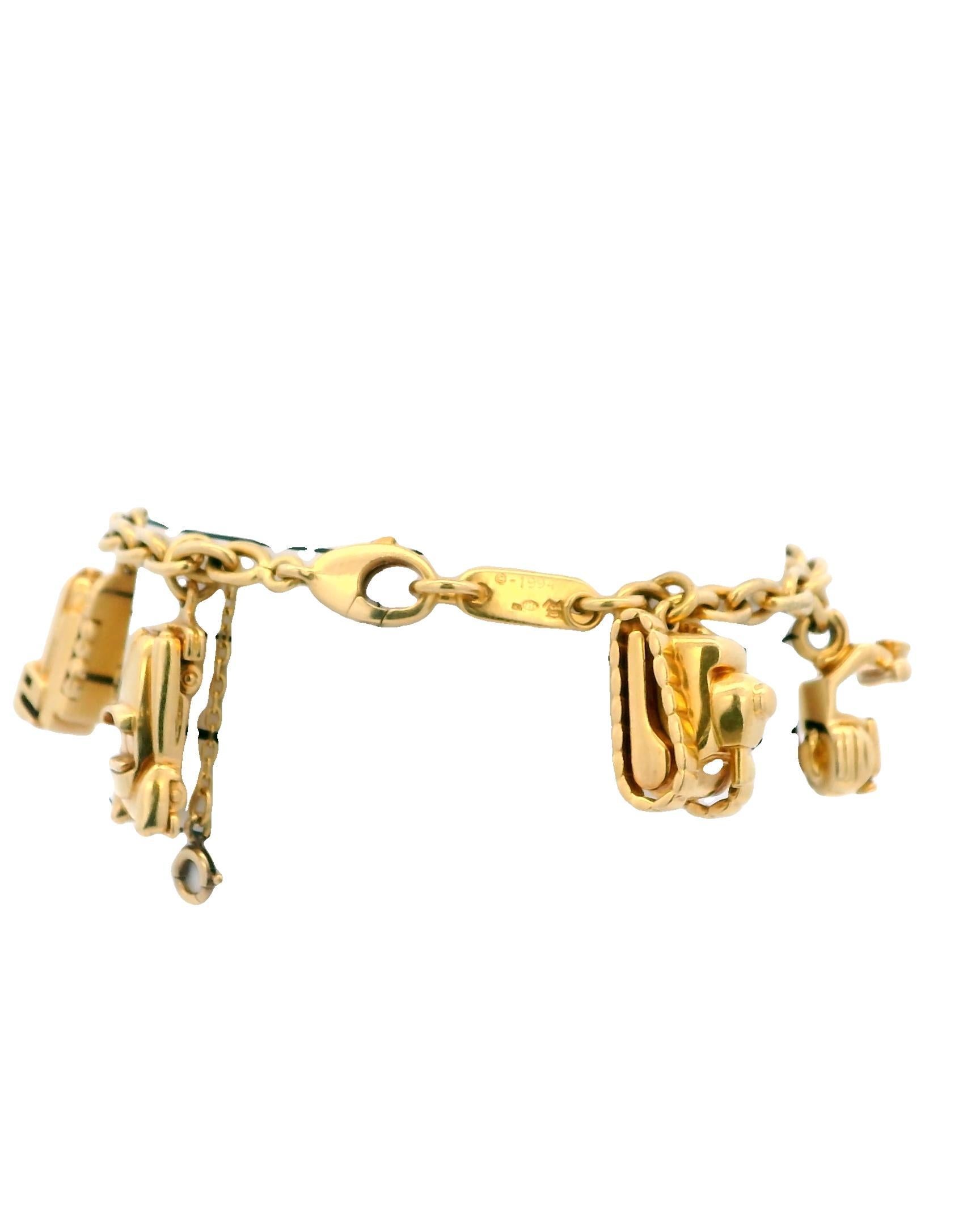 Cartier Estate 18K Yellow Gold 7 Charm Merry-Go-Round Bracelet For Sale 1