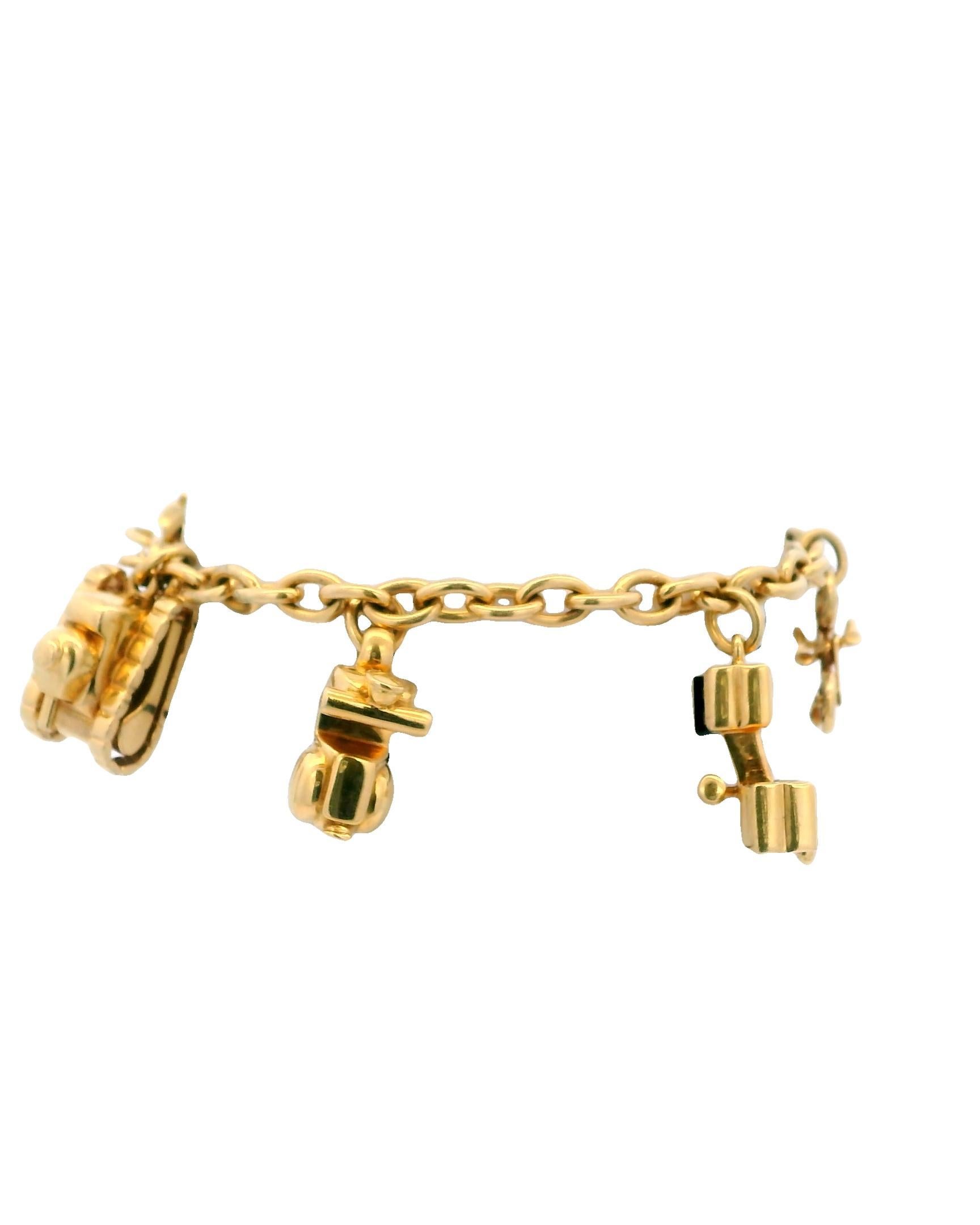 Cartier Estate 18K Yellow Gold 7 Charm Merry-Go-Round Bracelet For Sale 2