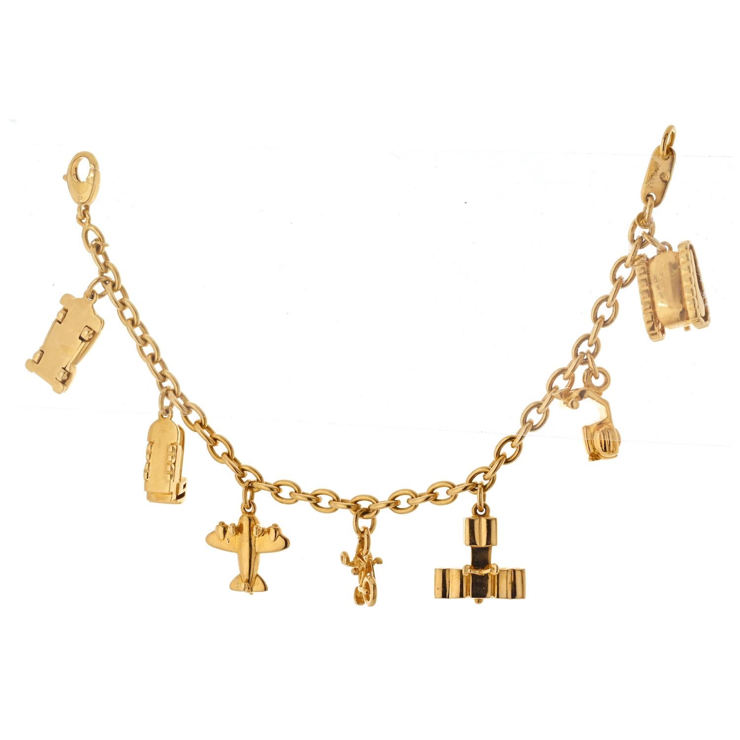 Women's or Men's Cartier Estate 18K Yellow Gold 7 Charm Merry-Go-Round Bracelet For Sale