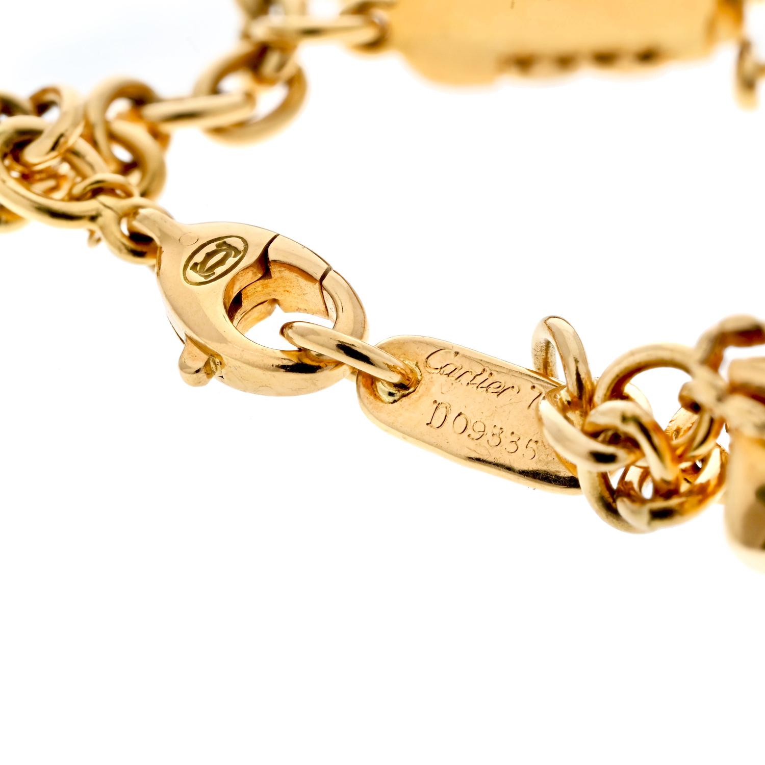Cartier Estate 18K Yellow Gold 7 Charm Merry-Go-Round Bracelet For Sale 1