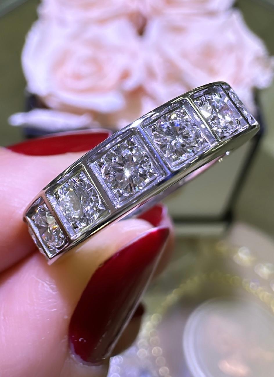 Cartier 750 white gold 18K anniversary band ring, width 5 mm, set with 9 brilliant-cut diamonds totaling approx. 1.35carats 
Size: 52 / 6.5 sizable W: 5mm
SKU: 129841

