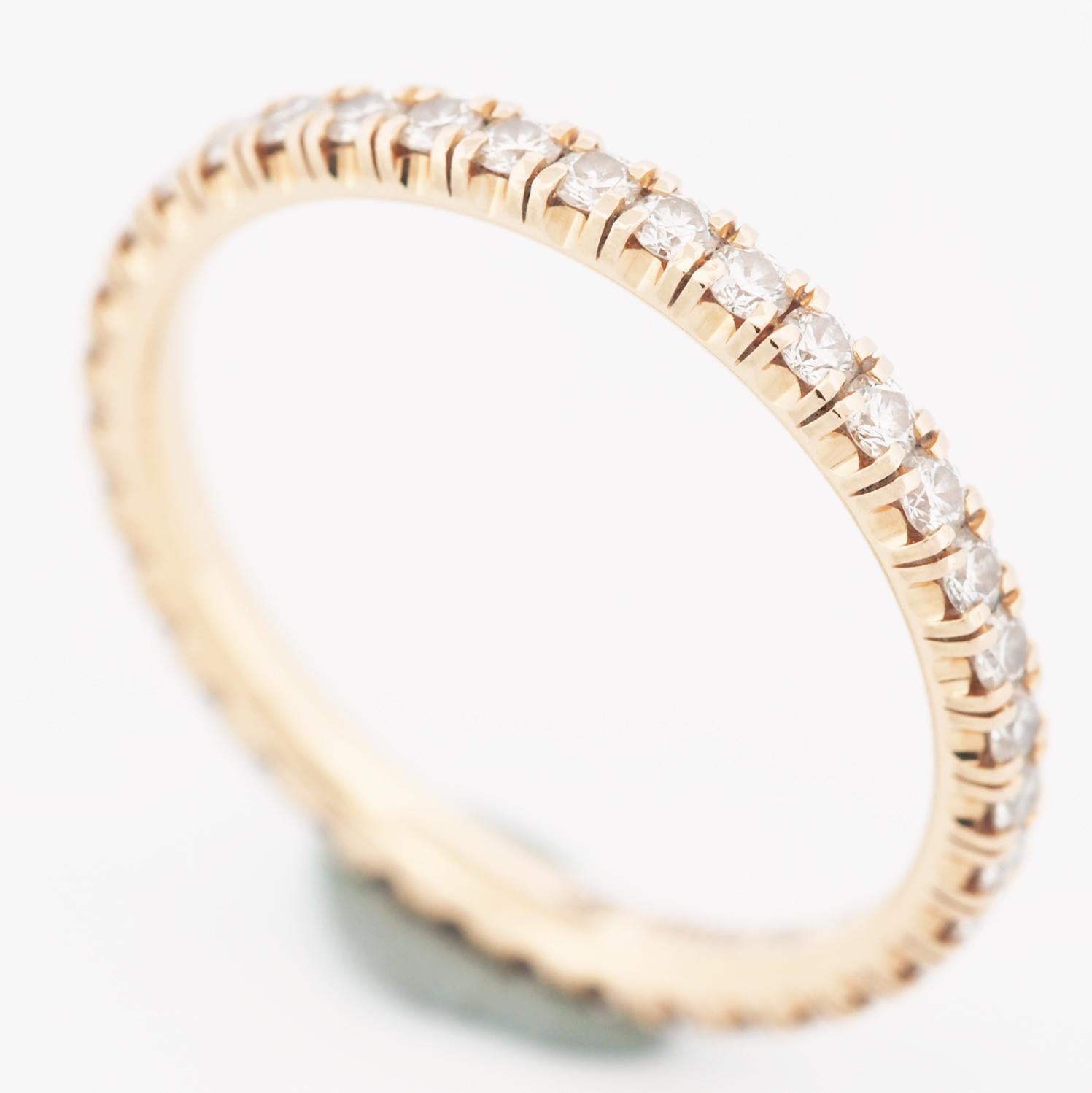Item: Authentic Cartier Etincelle Eternity Diamonds Ring
Stones: Diamond ( 0.47ct )
Metal: 18K Rose Gold
Ring Size: 50 US SIZE 5.0 UK SIZE J 1/2
Internal Diameter: 15.80 mm
Measurement: 2.0 mm width
Weight: 1.6 Grams
Condition: Used