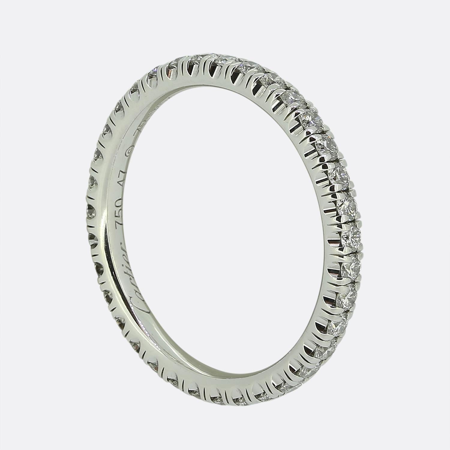Here we have a classic diamond full eternity ring from the world renowned jewellery house of Cartier. The band has been crafted from 18ct white gold and plays host to 35 round brilliant cut diamonds; all of which have been individually claw set in a