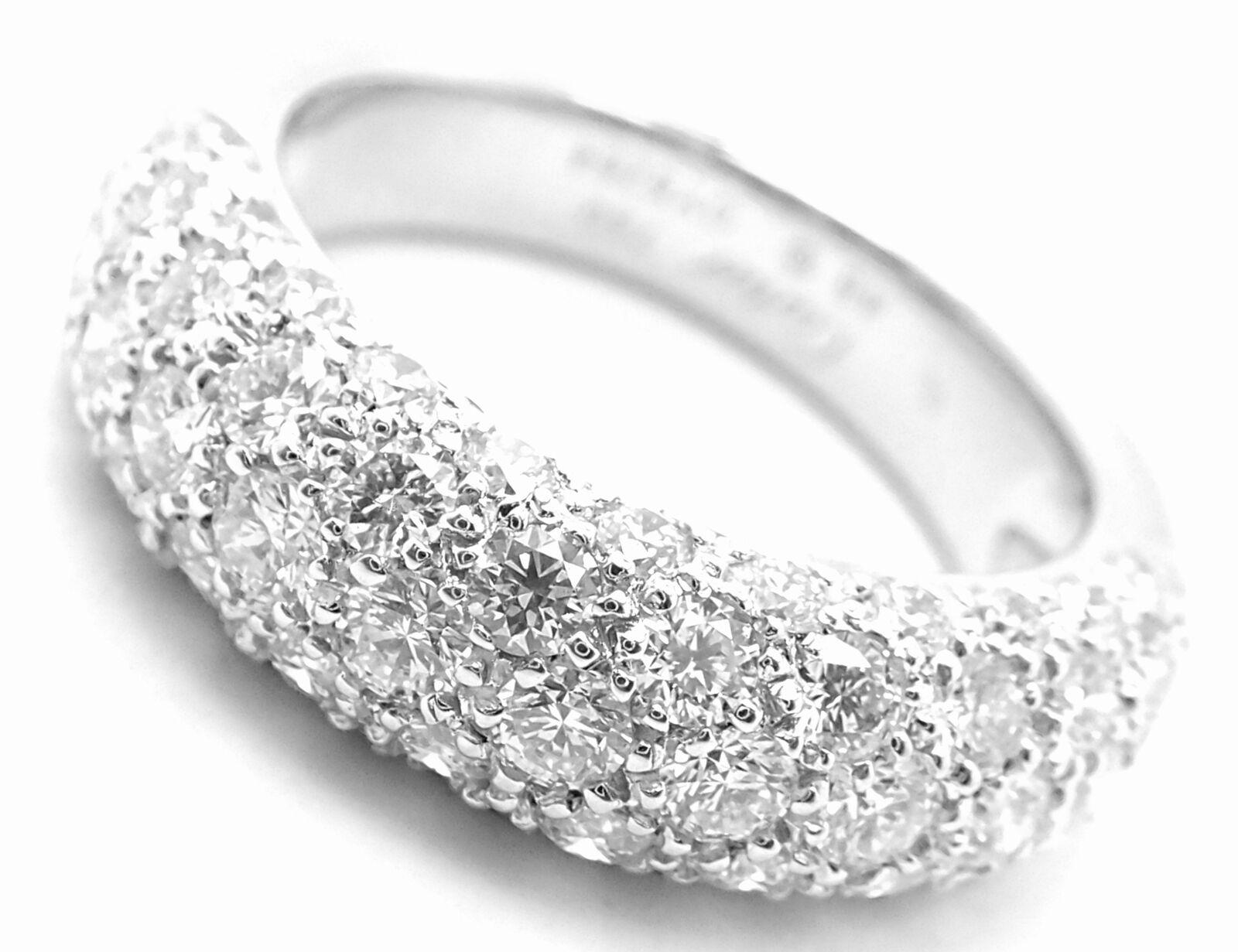 18k White Gold Diamond Etincelle De Cartier Band Ring by Cartier.  
With 59 Round brilliant cut diamonds VVS1 clarity, E color total weight approximately 1.33ct
This ring comes with original Cartier box and Cartier certificate of