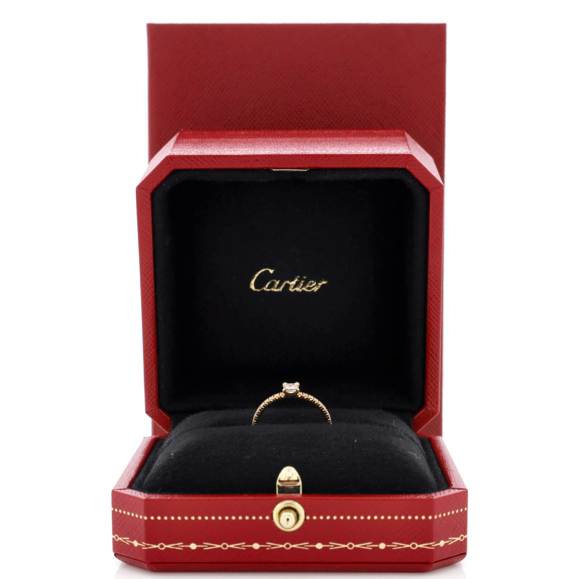 Condition: Very good. Moderate wear throughout.
Accessories:
Measurements: Size: 4.75 - 49, Width: 1.35 mm
Designer: Cartier
Model: Etincelle de Cartier Ring 18K Rose Gold with Princess Cut Diamond and Pave Diamonds
Exterior Color: Yellow Gold
Item