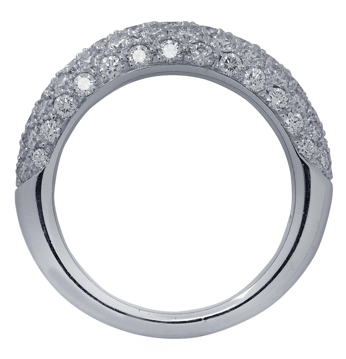 From the iconic house of Cartier, this spectacular Etincelle de Cartier diamond wedding band is expertly crafted in 18 karat white gold, and features a dome shaped band encrusted with 69 round brilliant cut diamonds weighing approximately 1.33