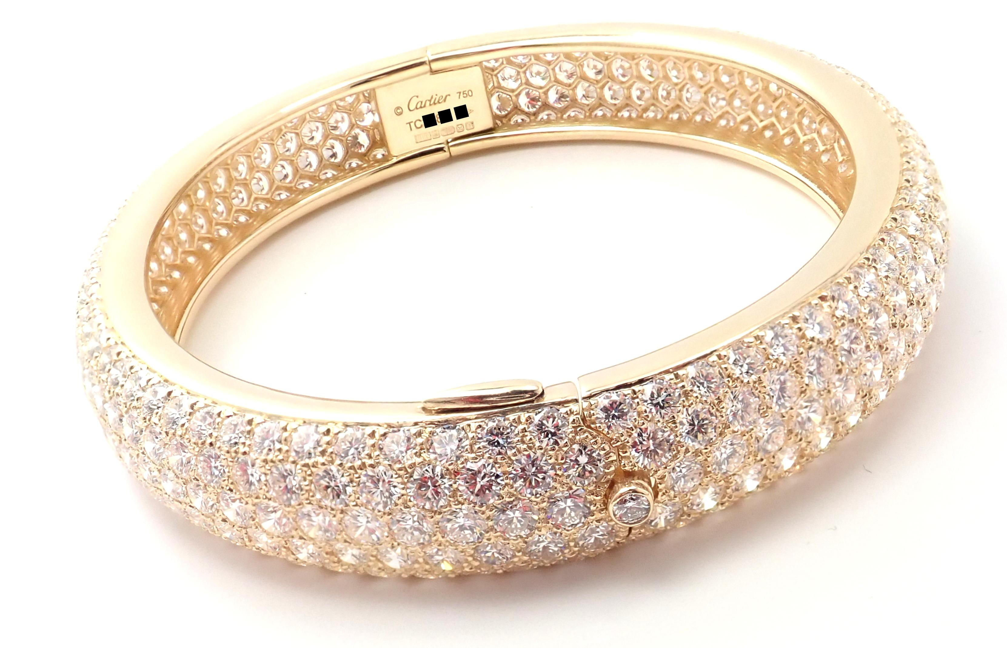 18k Yellow Gold Diamond Pave Etincelle Bangle Bracelet by Cartier. 
With 371 round brilliant cut diamonds VVS1 clarity, E color total weight approximately 20ct
Details: 
Weight: 47 grams
Length: 7