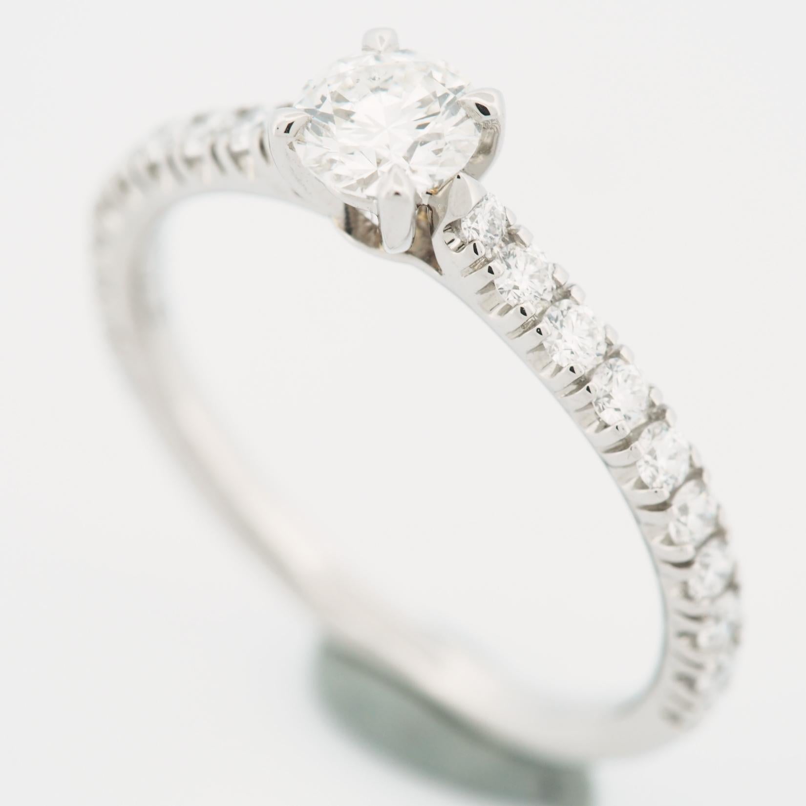 Item: Authentic Cartier Etincelle Diamond Solitaire Ring
Stones: Diamond ( center stone 0.31ct )
Color: G
Clarity:VS1
Polish: Excellent
Symmetry: Excellent
Fluorescence: None
Metal: Platinum 950
Ring Size: 49 US SIZE 4.75 UK SIZE I 3/4 
Internal