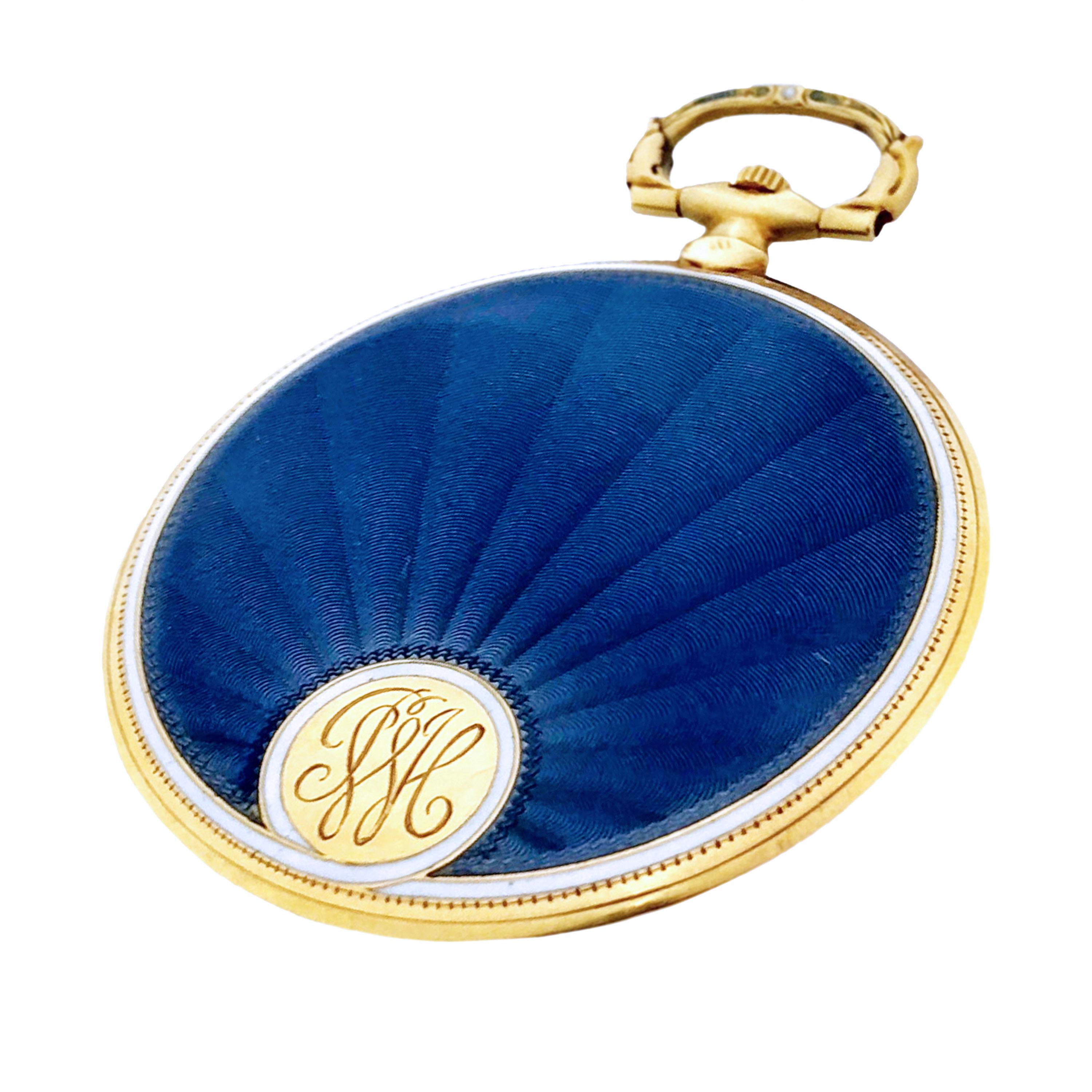 Circa 1920s Cartier pocket Watch, 46 MM Diameter and 4.5 MM thick 18K Yellow Gold 2 piece case. Blue and White Guilloche Enamel. Mechanical, Manual wind EWC, European Watch & Clock Movement. White Guilloche Dial with Black Roman Numerals. Excellent