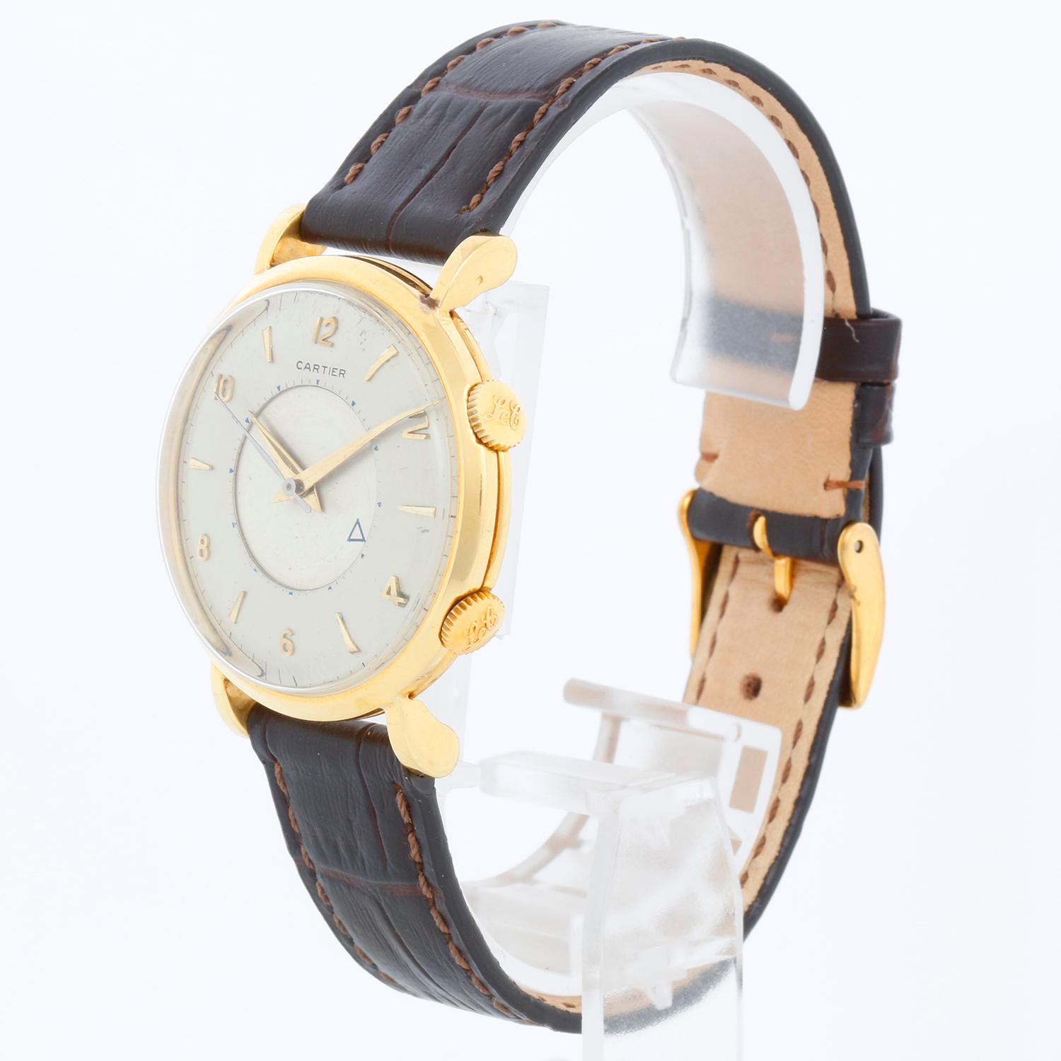 Cartier Extremely Rare 18k (E.W.C) Alarm Watch With Hollywood Providence  - Manual wind. Signed and finished by European Watch & Clock (EWC). 18K Yellow gold (35 mm ) Case has not seen much polish as evidenced by the strong gold hallmarks on the lug