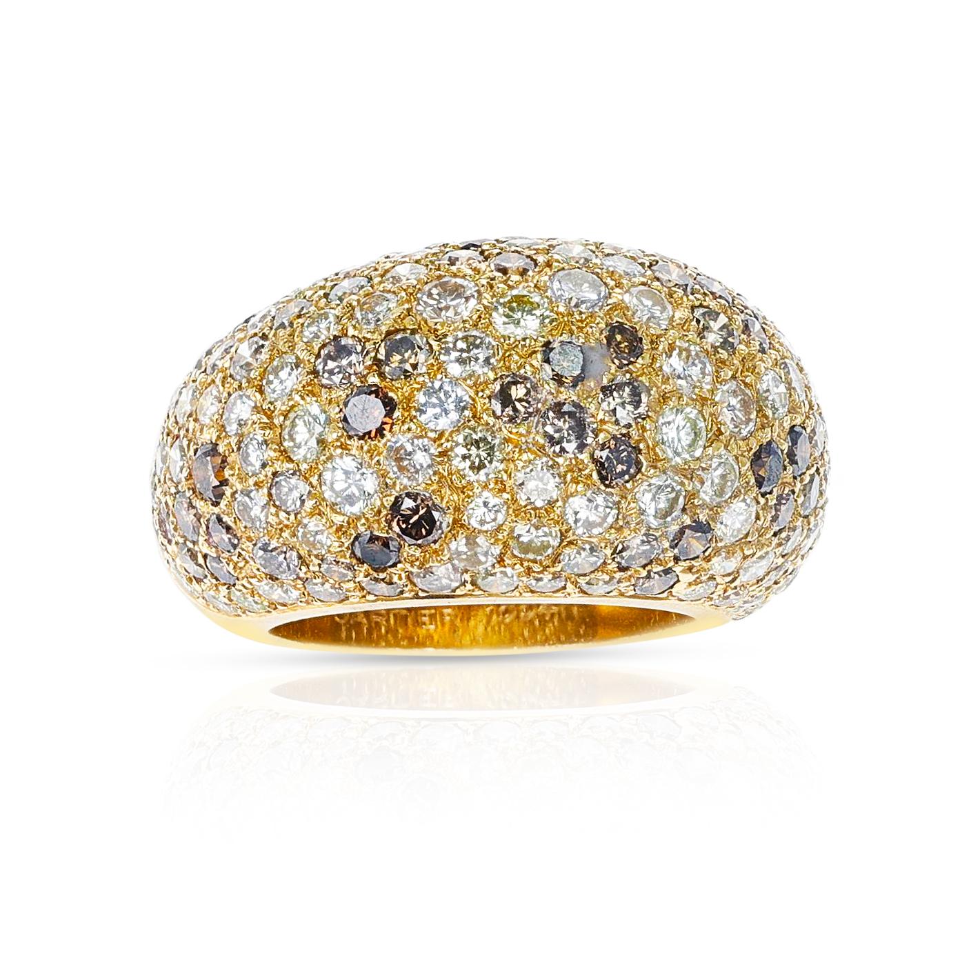A Cartier Fancy Color Diamonds Bombé Ring with diamonds colors such as brown and white. Has a pair of Matching Earrings. The diamonds weigh appx. 4 carats. The ring size is US 6.25. Signed Cartier. 

