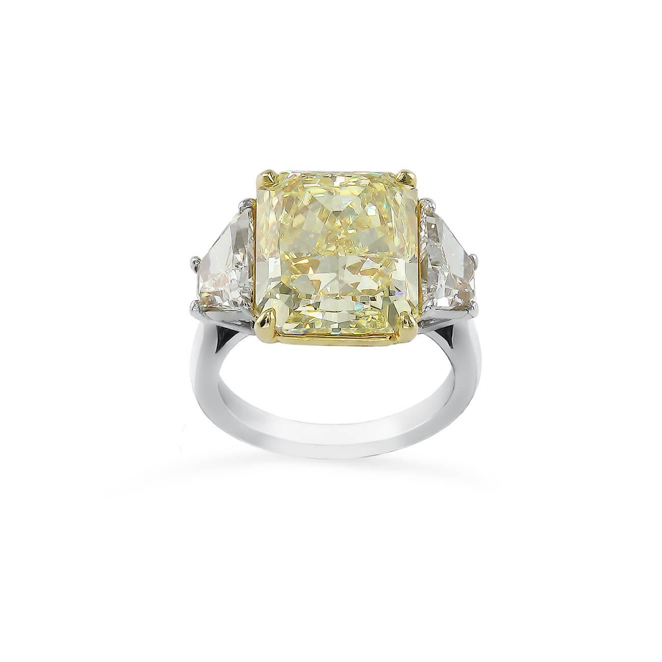 Cartier ring
Ring Size: 6
Platinum and 18K yellow gold
10.18CT fancy yellow radiant cut GIA FY/VS1 diamond
2.07ctw F-G/VS1-VS2 trapezoid brilliant white diamond
Includes original box, Cartier valuation report, GIA Certificate for fancy yellow diamond