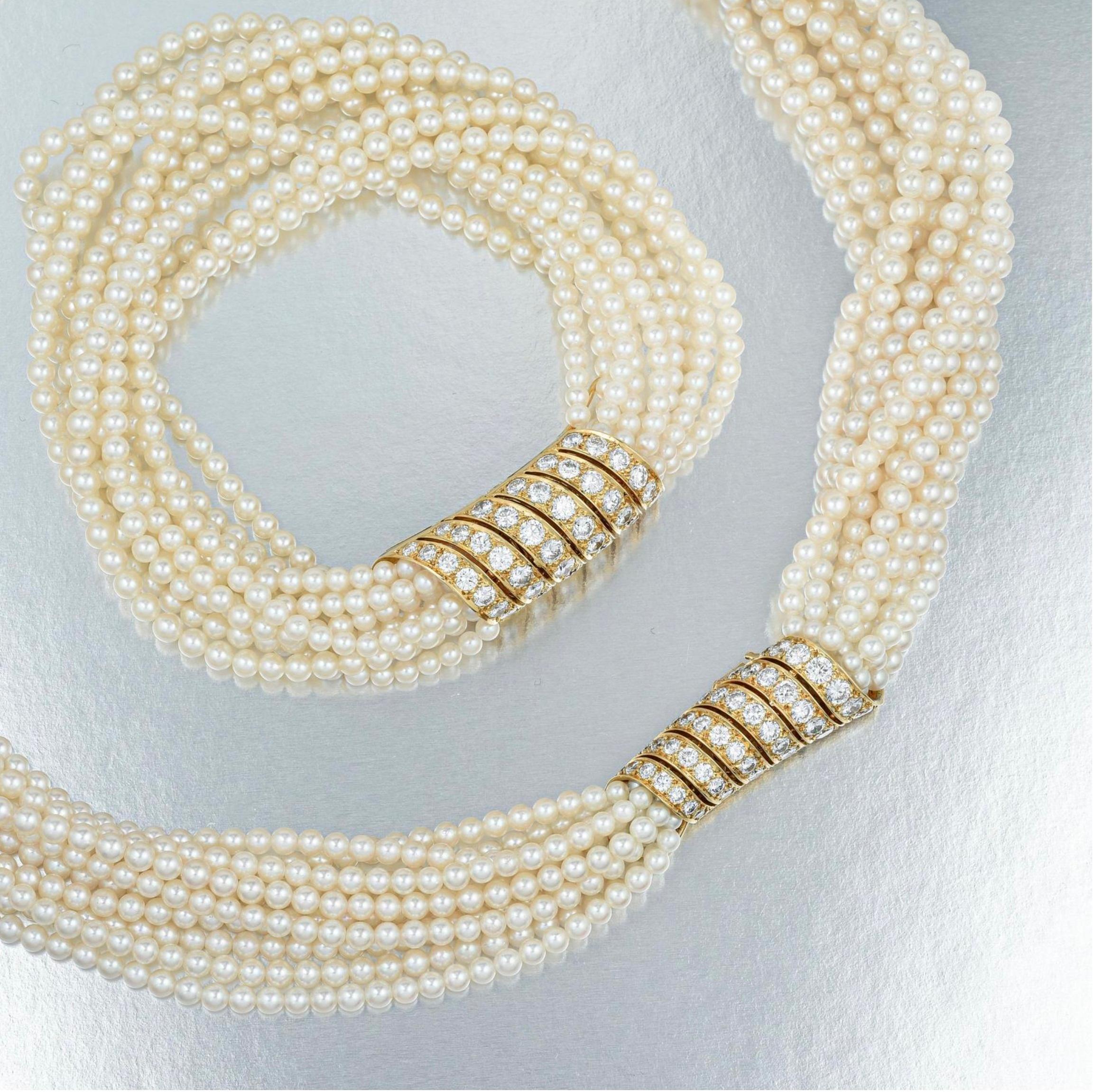 18k gold; set with round brilliant-cut diamonds weighing approx. 8.45 cts, most with F-G color and VVS- VS Clarity; with cultured seed pearls measuring approx 3.00 - 3.50 mm in diameter; necklace measures 18-1/8 inches; bracelet measures 8-1/8