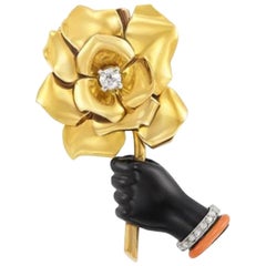 Broche Cartier Flor en Mano