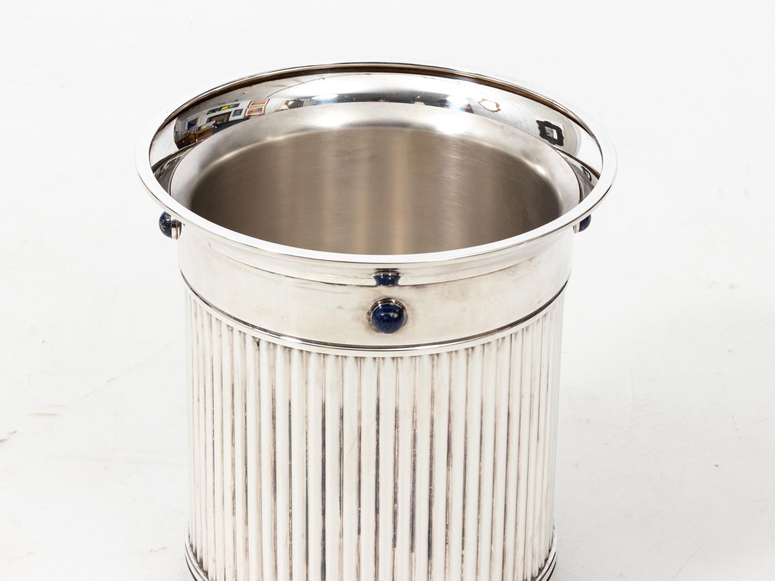 Extra large silver plate Champagne cooler or ice bucket by Cartier with Lapis Lazuli Cabochons, circa mid-20th century. The piece also features a brand stamp underneath. Made in Spain. Please note of wear consistent with age.