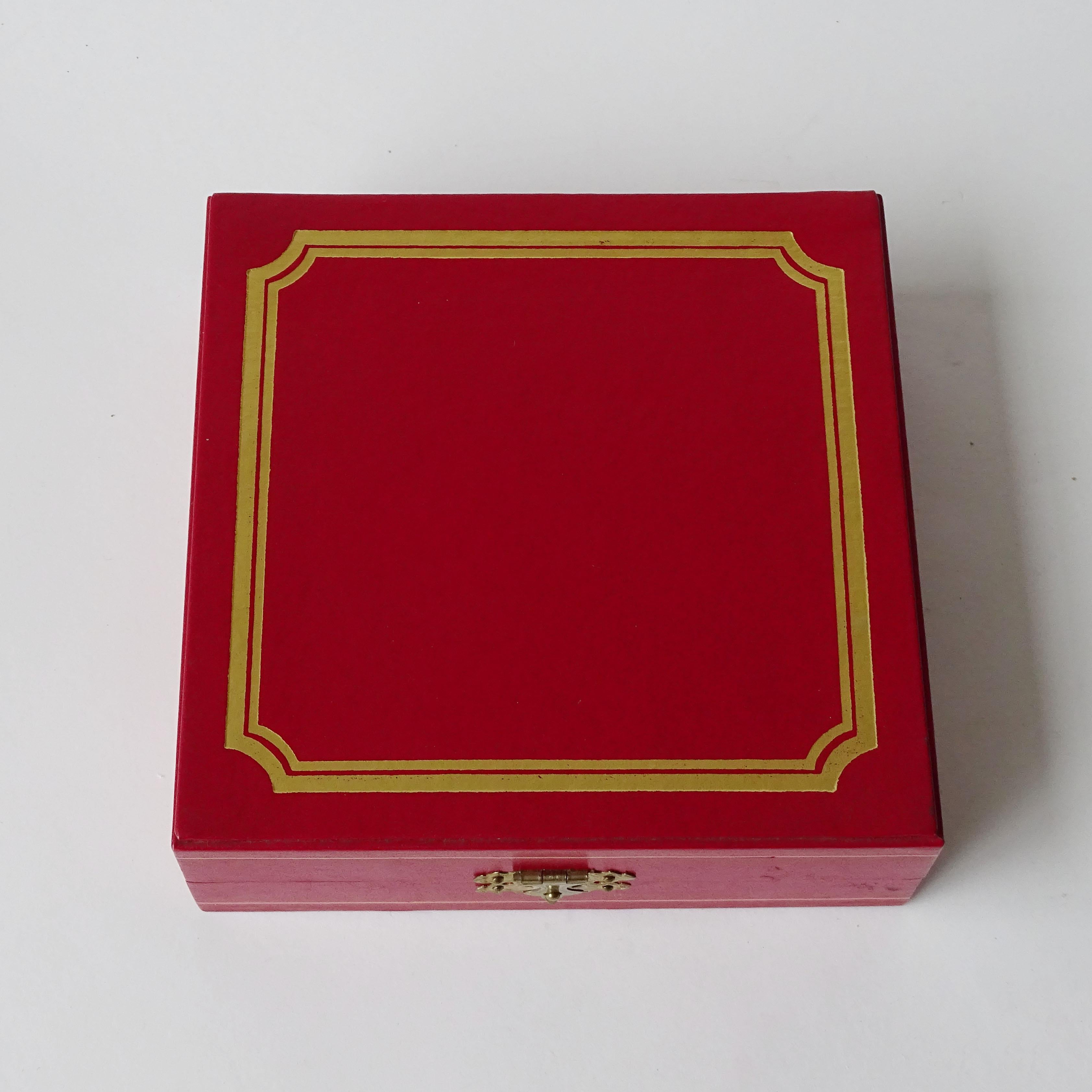 Cartier Four Trinity Napkin Rings in their original Box, France 1970s
Signed Cartier in each set.