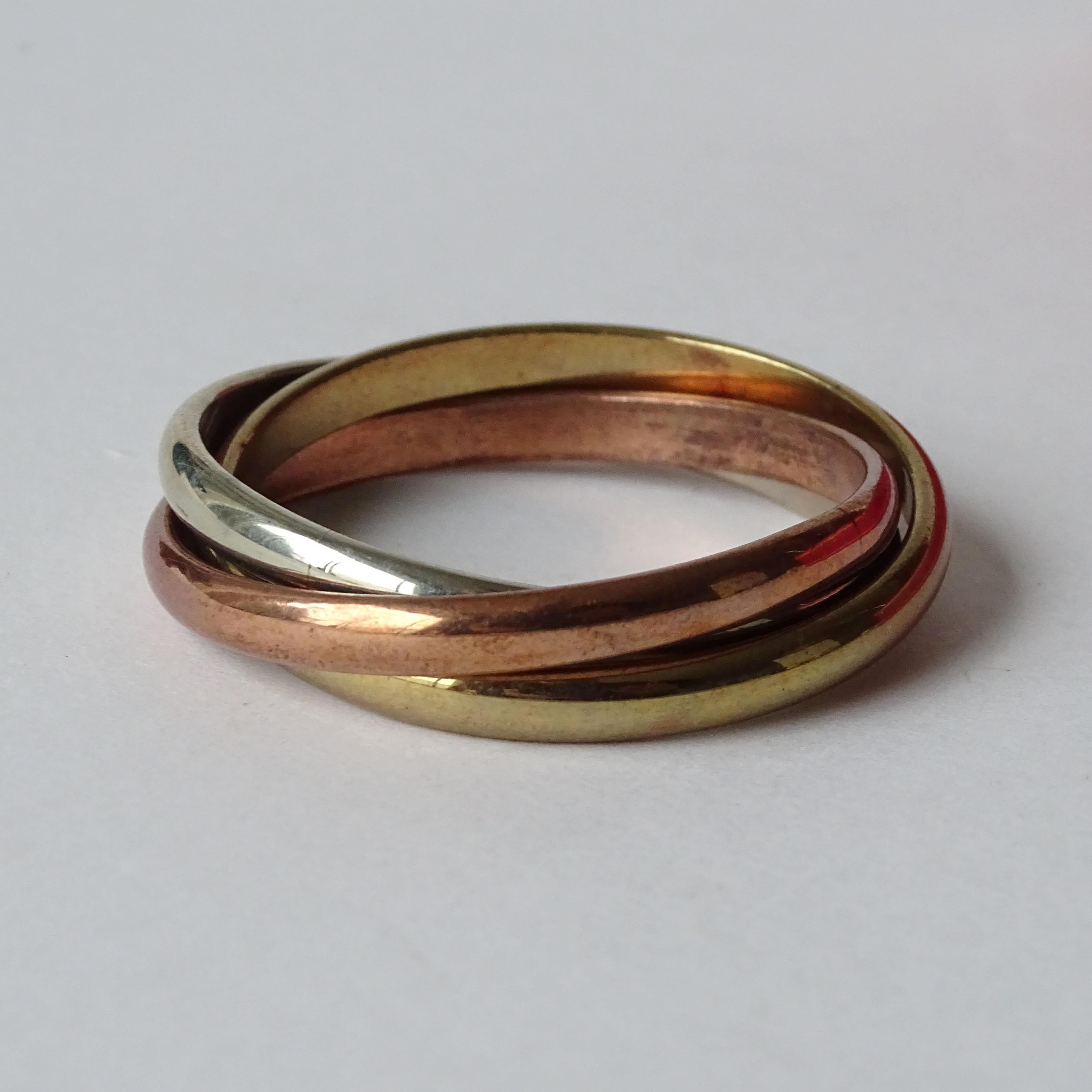 Cartier Four Trinity Napkin Rings in their original Box, France 1970s In Excellent Condition In Milan, IT