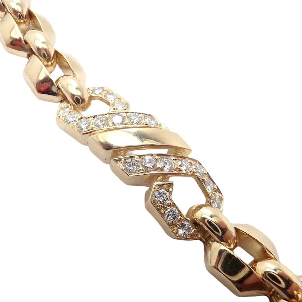 18k Yellow Gold Fox Trot Diamond Bracelet by Cartier from the 1980's. 
With 40 round brilliant cut diamonds VVS1 clarity, E color total weight approximately 1.00ct
This stunning bracelet comes with a Cartier box.
Details: 
Weight: 35.5 grams