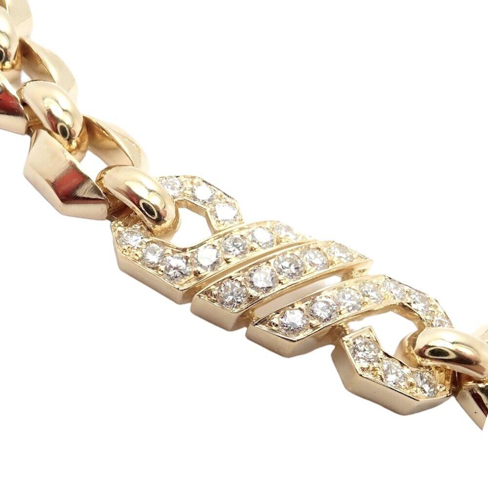 18k Yellow Gold Fox Trot Diamond Necklace by Cartier from the 1980's. 
With 75 round brilliant cut diamonds VVS1 clarity, E color total weight approximately 2.00ct
This stunning necklace comes with a Cartier box.
Details: 
Weight: 82 grams 
Length: